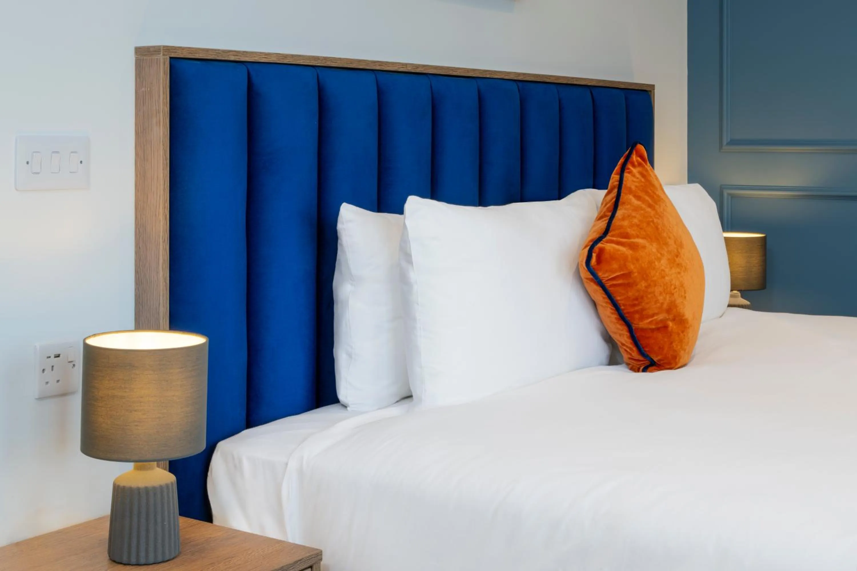 Bed in Station Suites Aparthotel