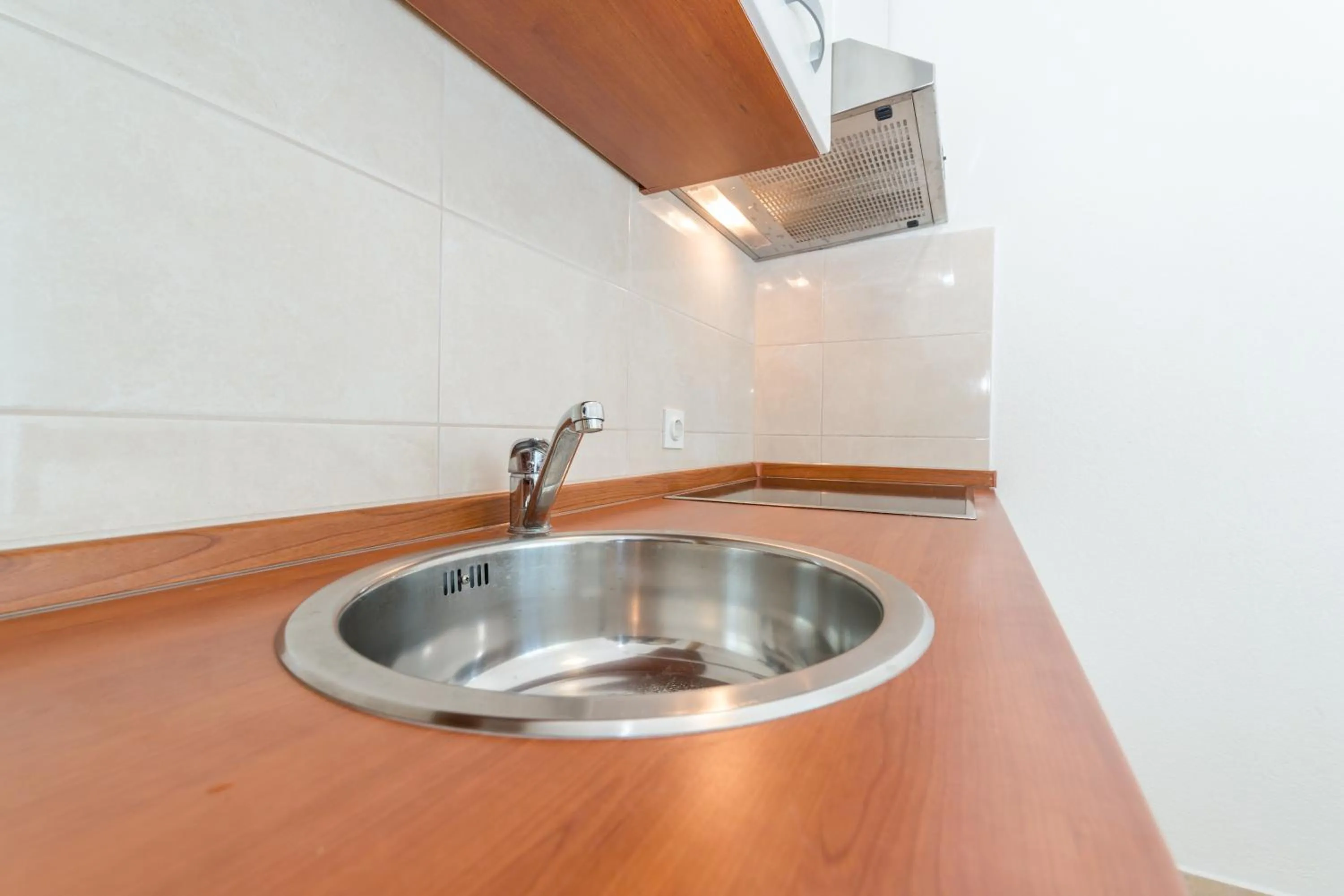 Kitchen or kitchenette in Apartments Brekalo