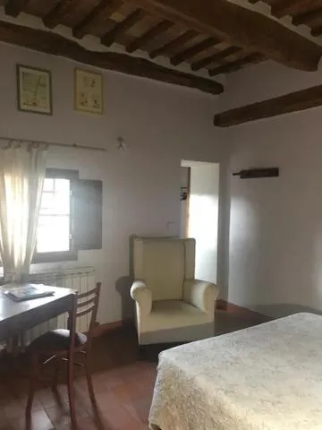 Photo of the whole room, Bed in La Locanda del Loggiato