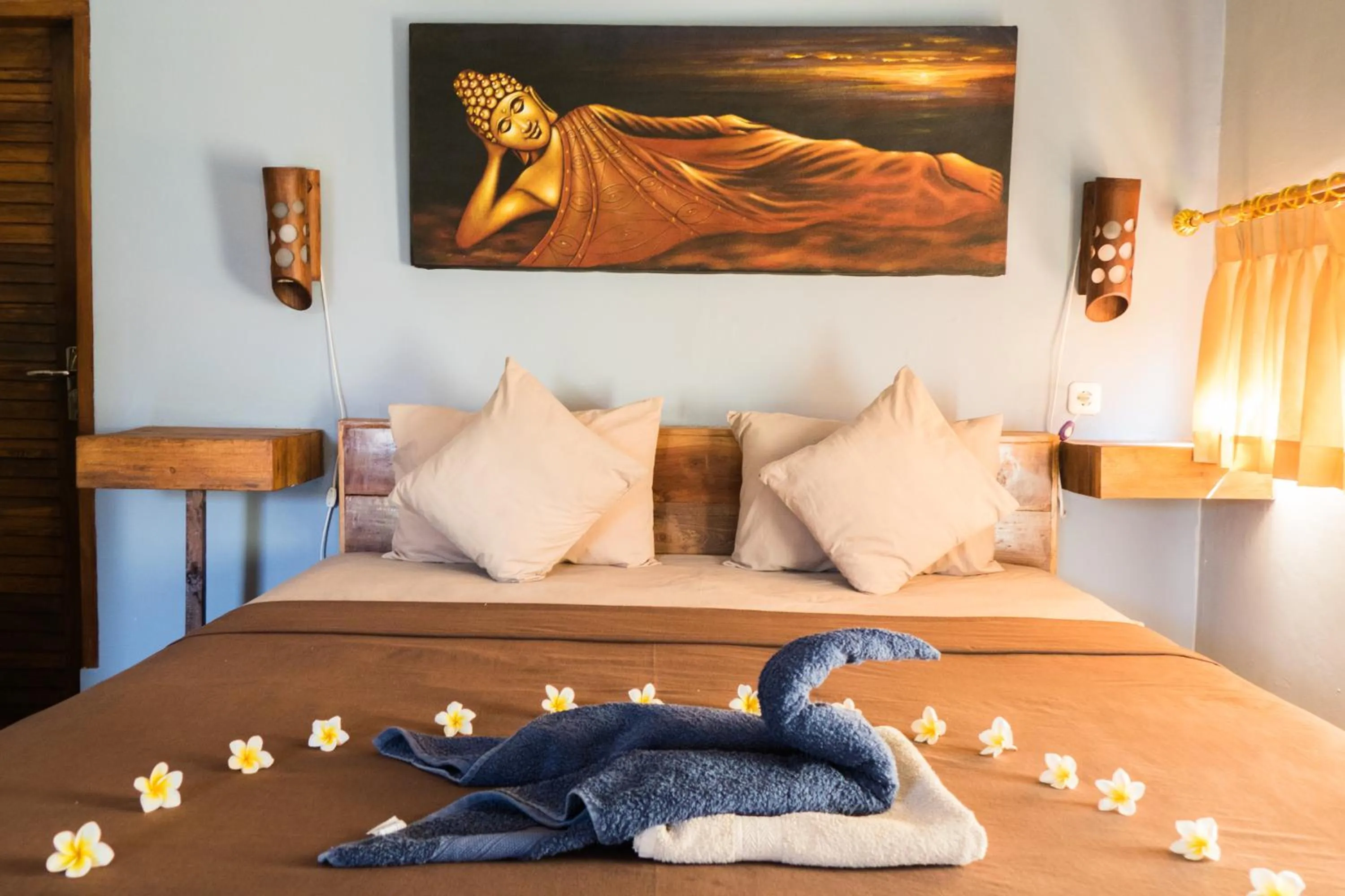 Bed in Mandalika Cottage