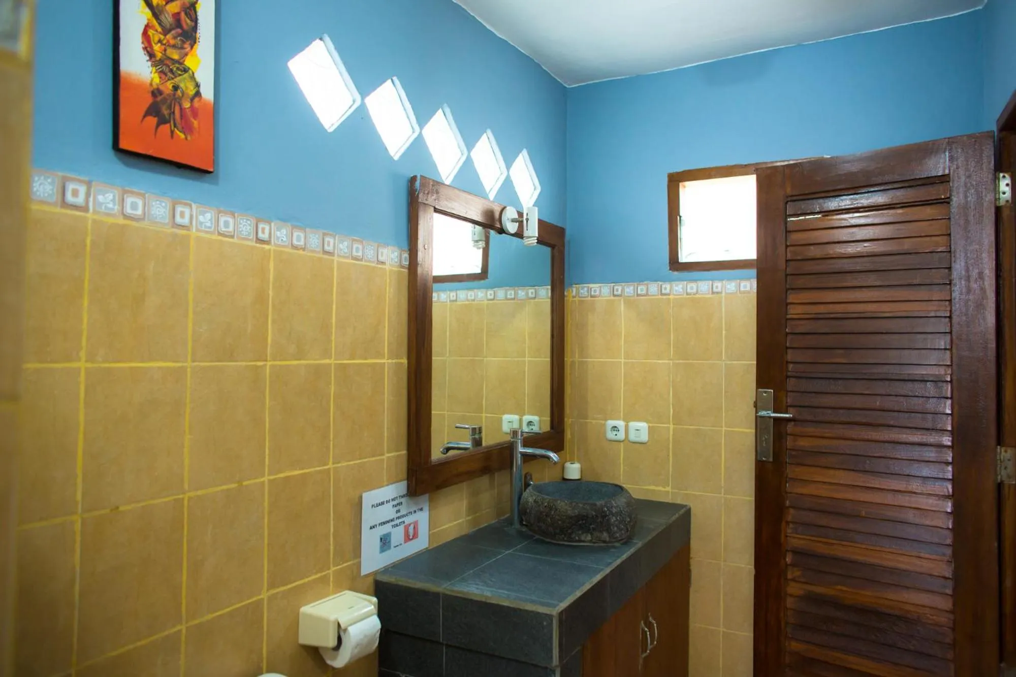 Toilet in Mandalika Cottage