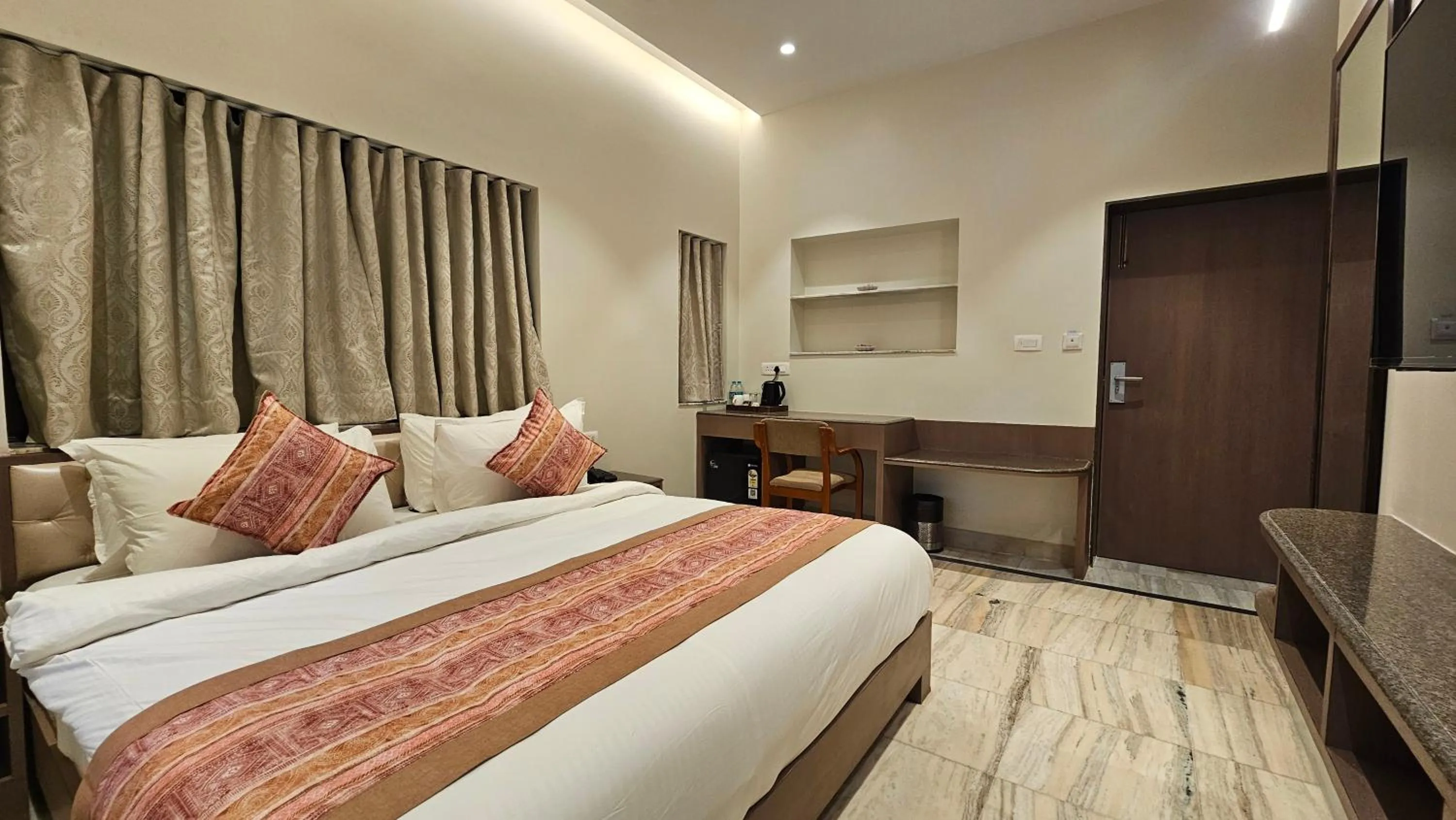 Bed in Deora Resort and Hotel