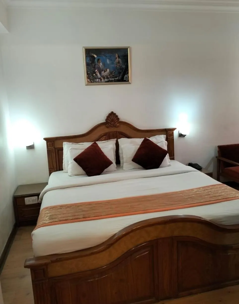 Bed in hotel Baljees Regency