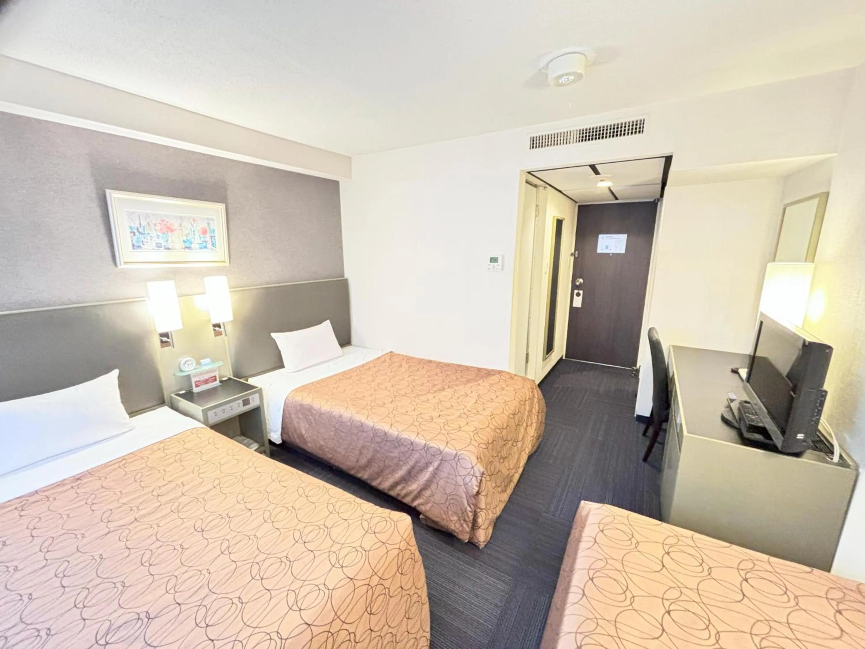 Twin Room with Extra Bed in Grand Central Hotel