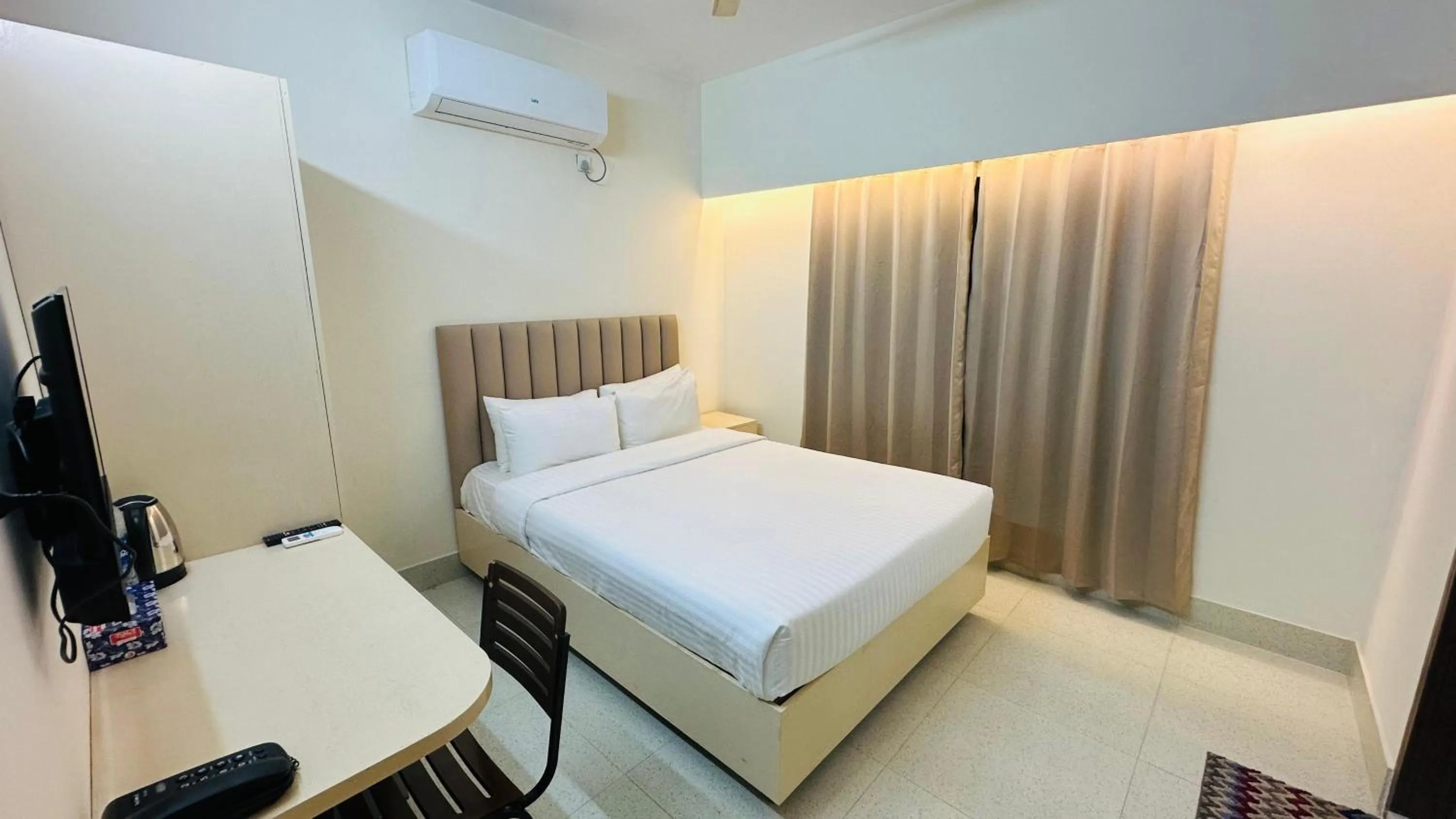 Photo of the whole room, Bed in Royal Regent Suites Dhaka