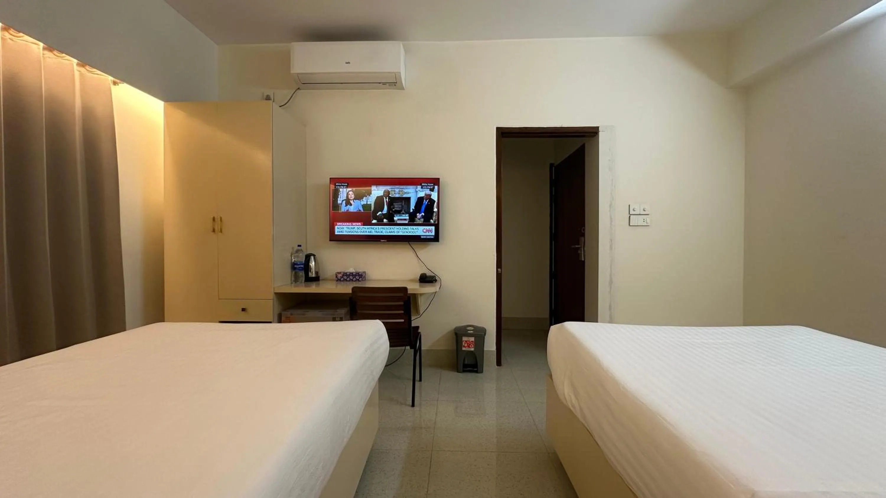 Bed in Royal Regent Suites Dhaka