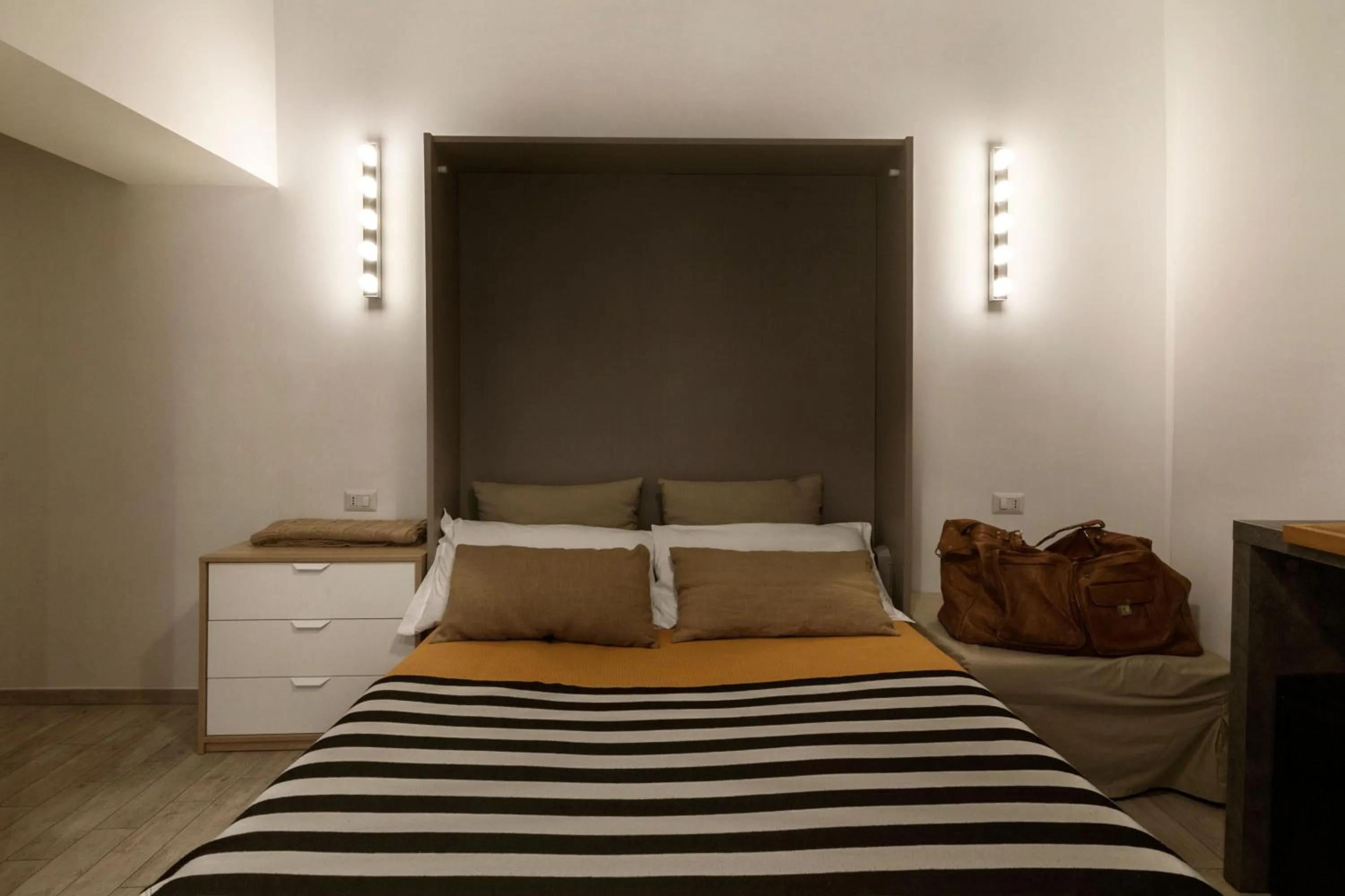 Photo of the whole room, Bed in Room of Arts