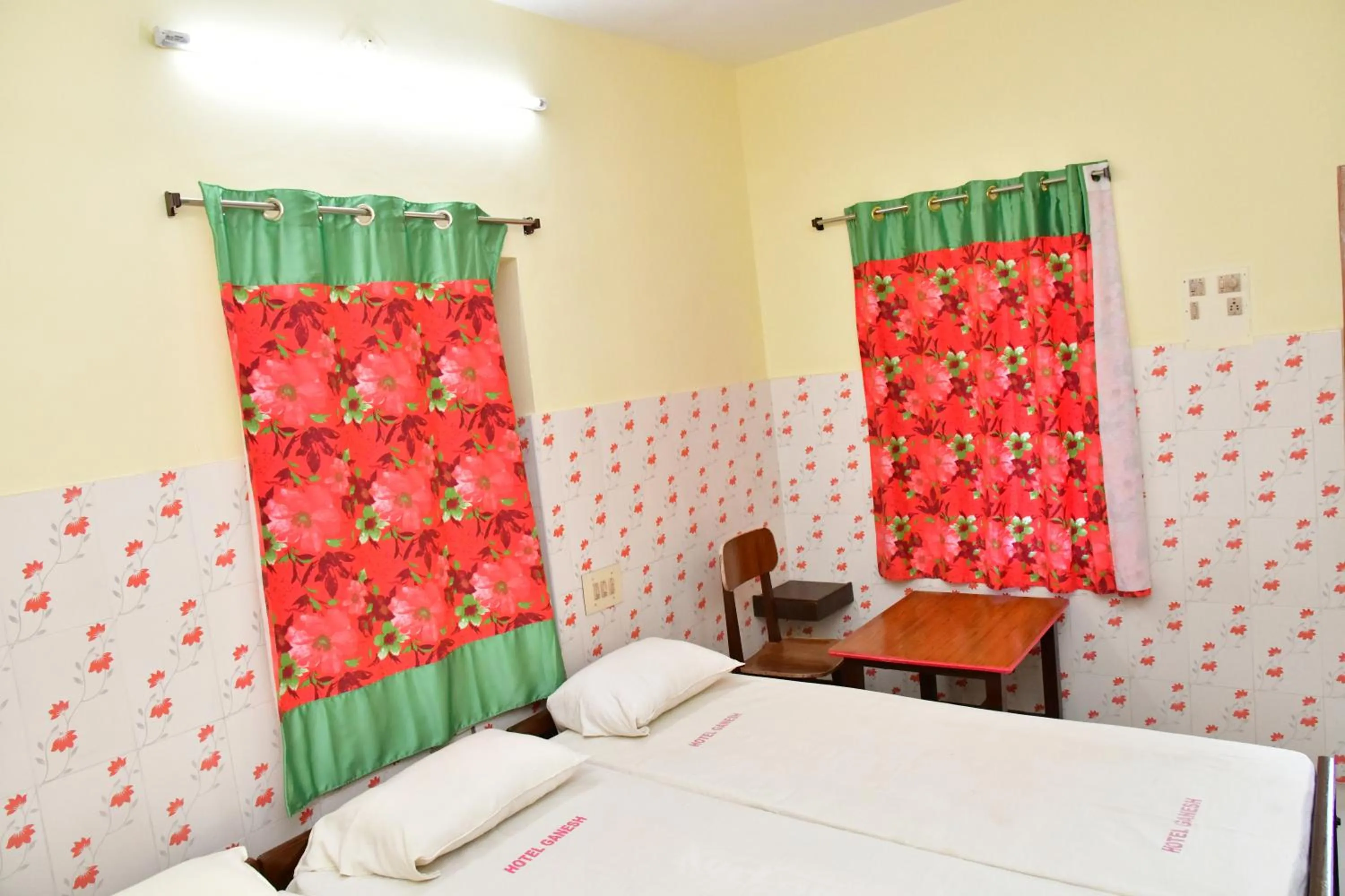 Bed in Hotel Ganesh Lodge