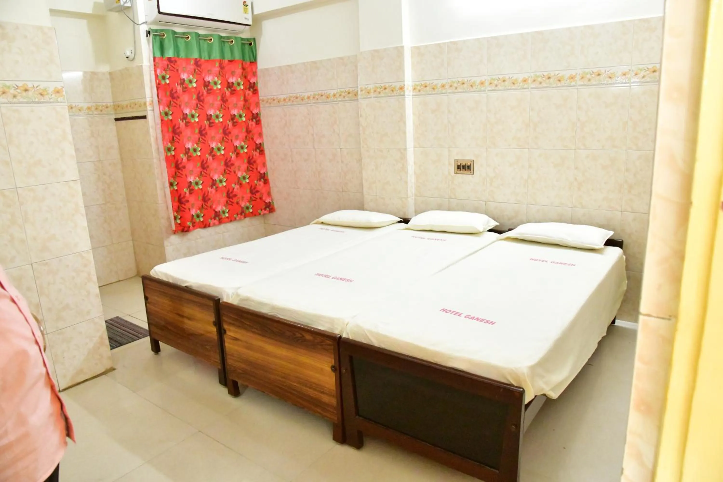 Photo of the whole room, Bed in Hotel Ganesh Lodge