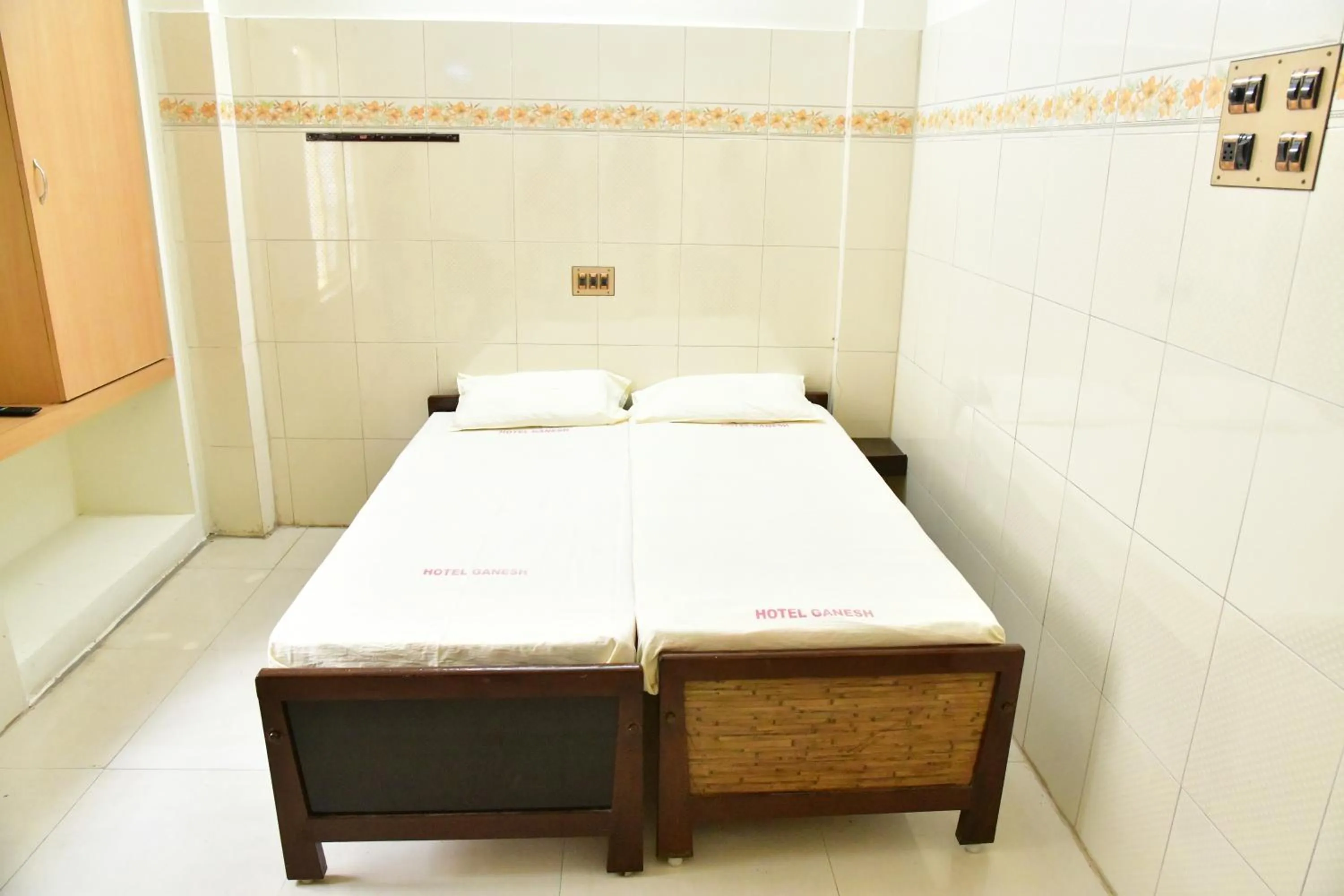 Bed in Hotel Ganesh Lodge