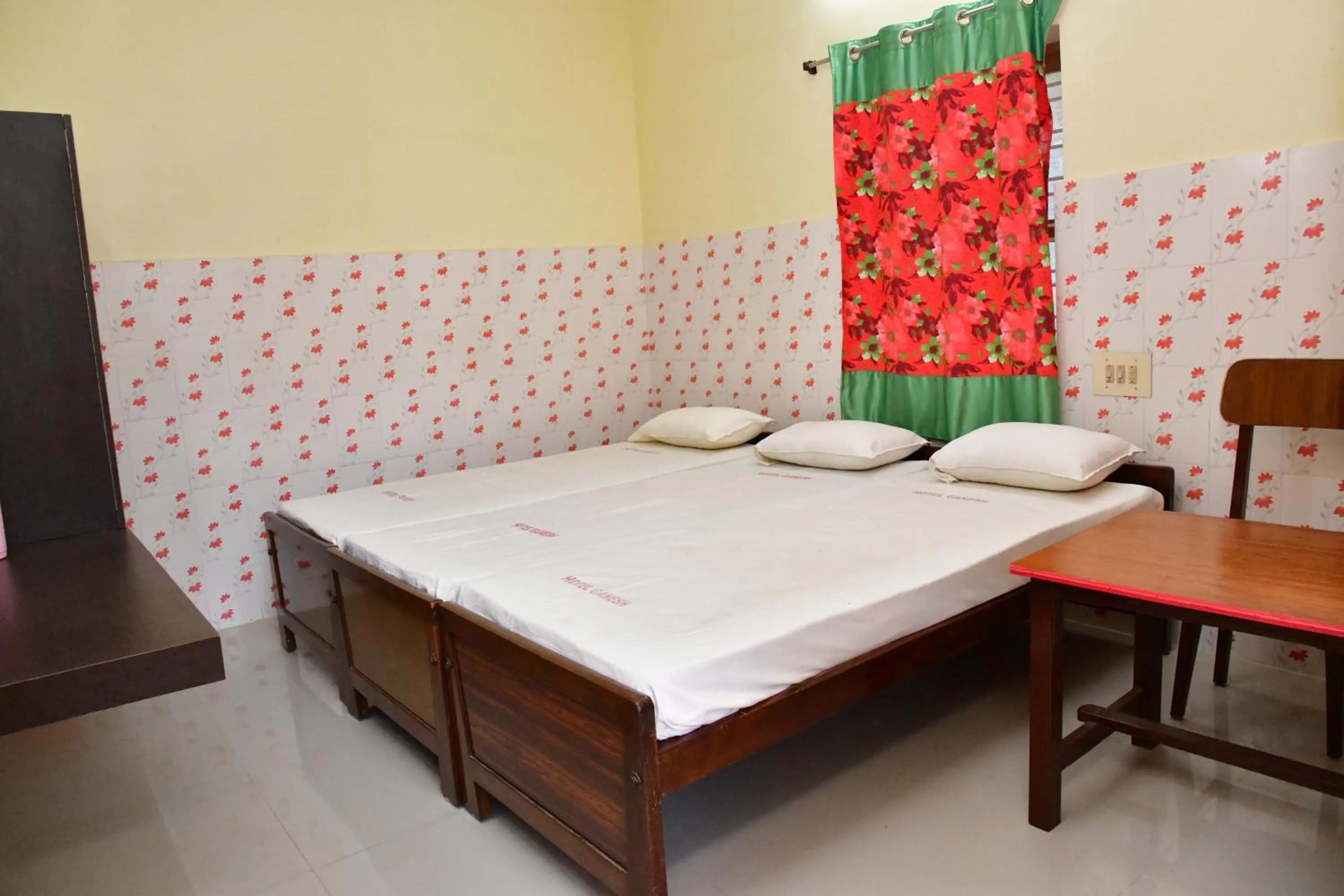Photo of the whole room, Bed in Hotel Ganesh Lodge