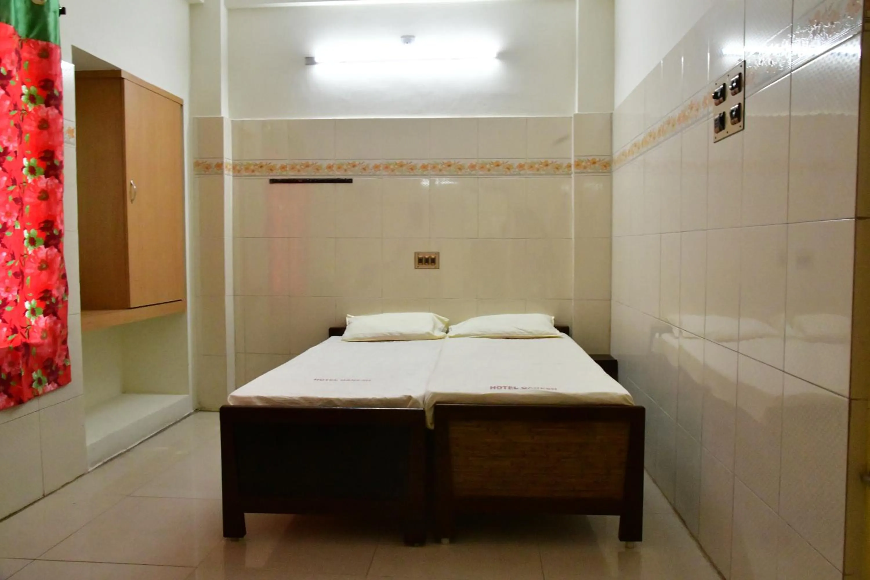 Bed in Hotel Ganesh Lodge