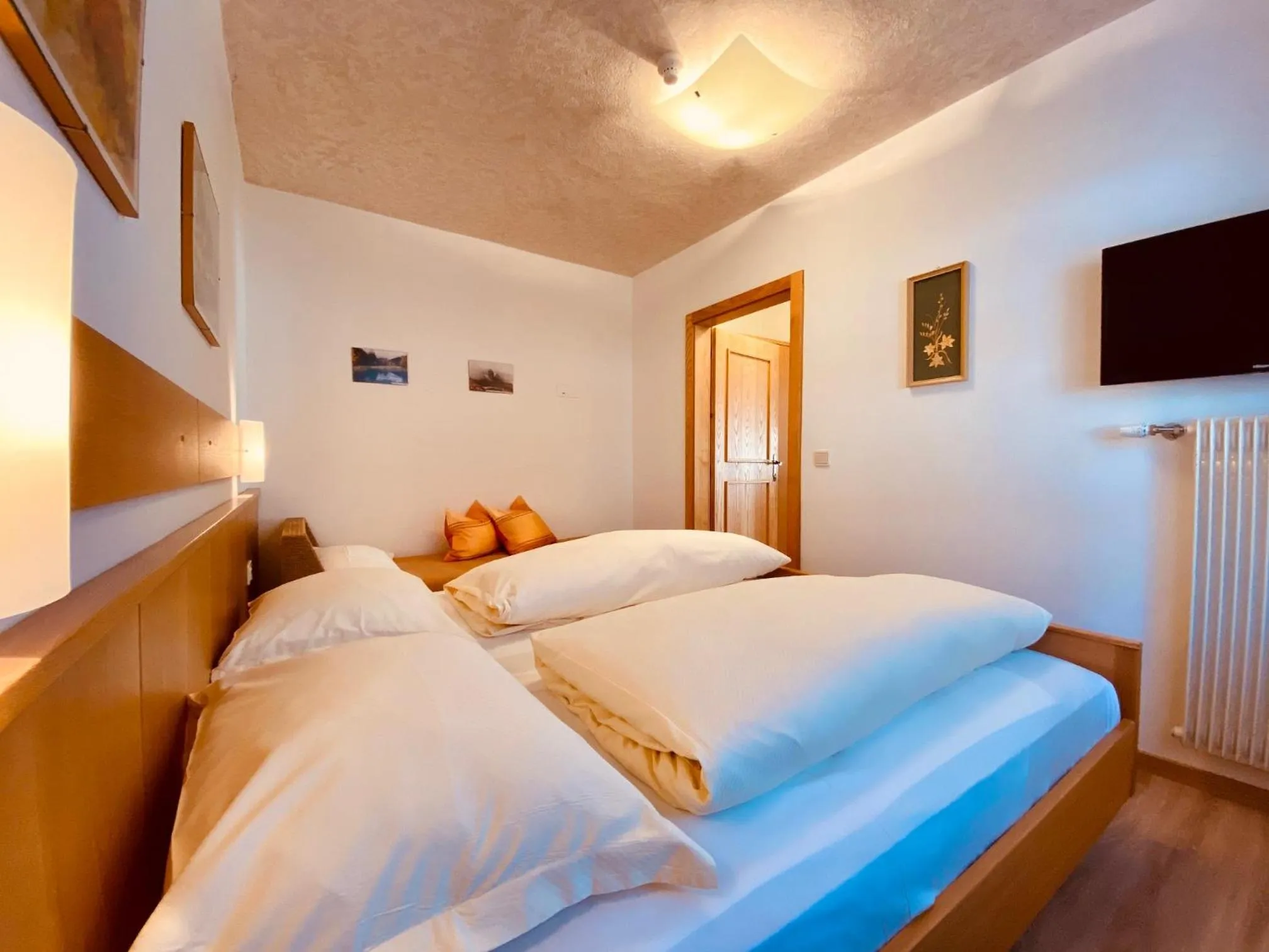 Bed in Apartments Residence Montana