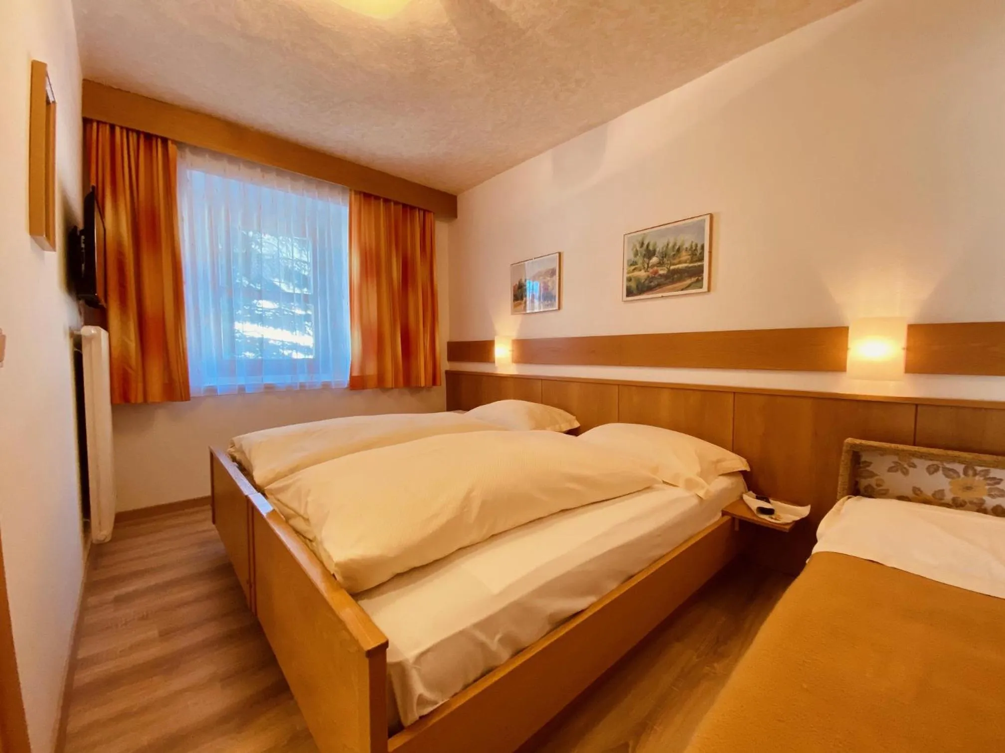 Bed in Apartments Residence Montana