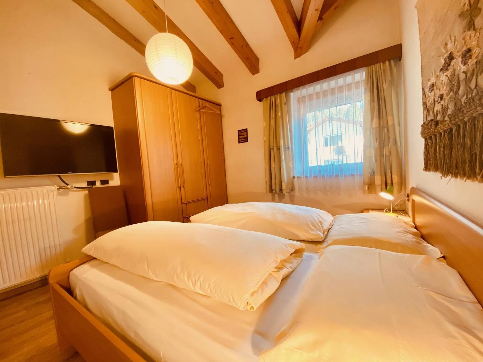 Bed in Apartments Residence Montana