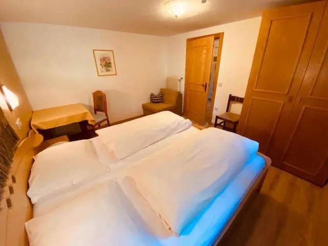 Bed in Apartments Residence Montana