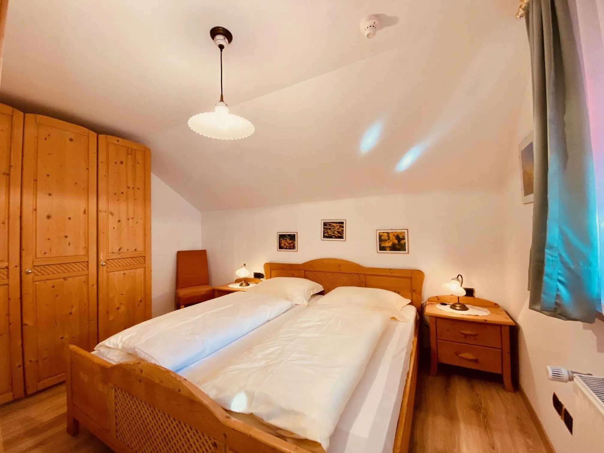 Bed in Apartments Residence Montana