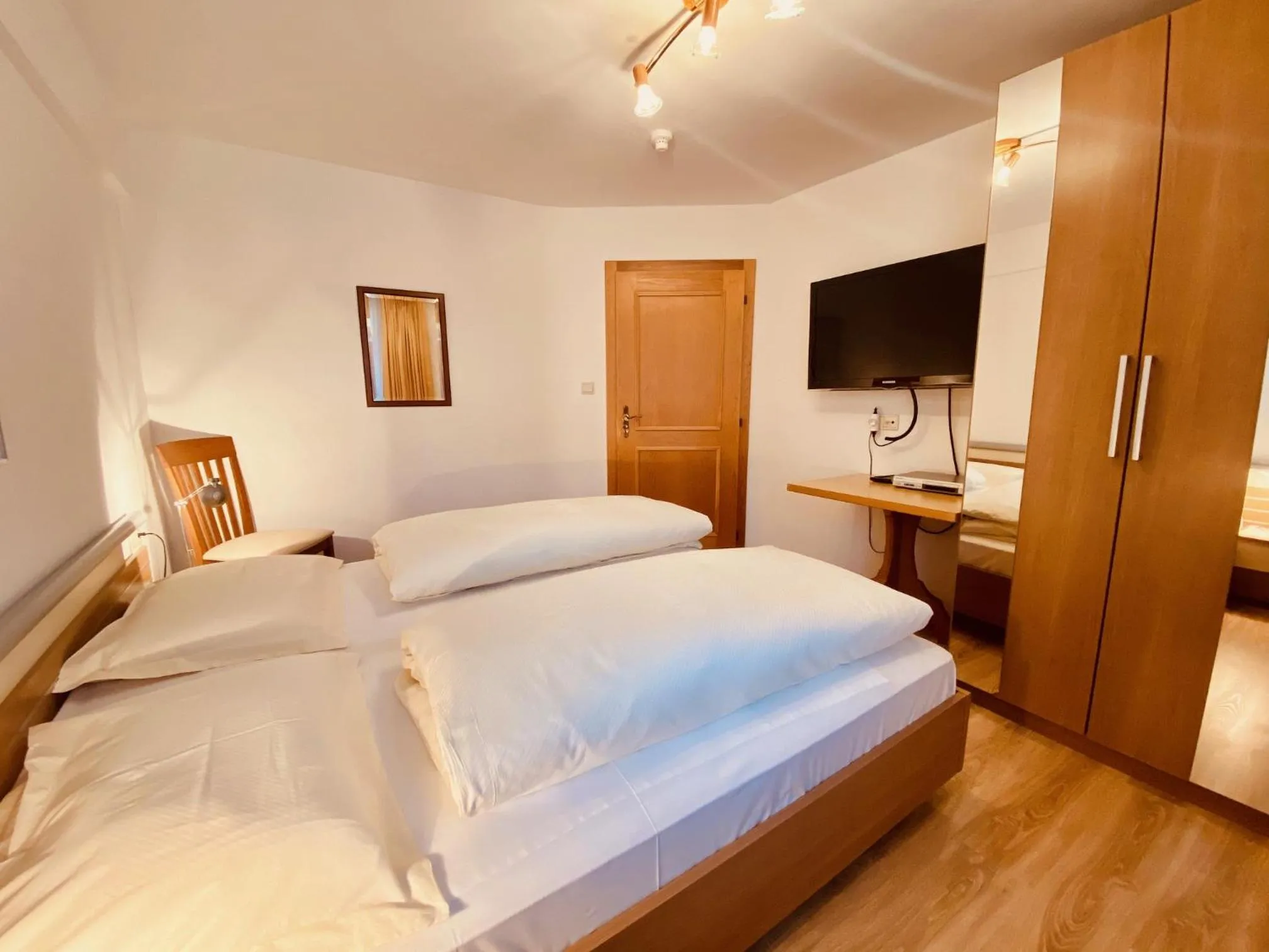 Bed in Apartments Residence Montana