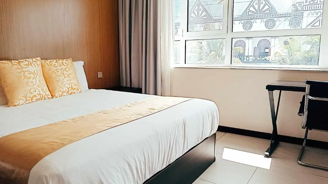 Bed in Tauese Seaview Hotel