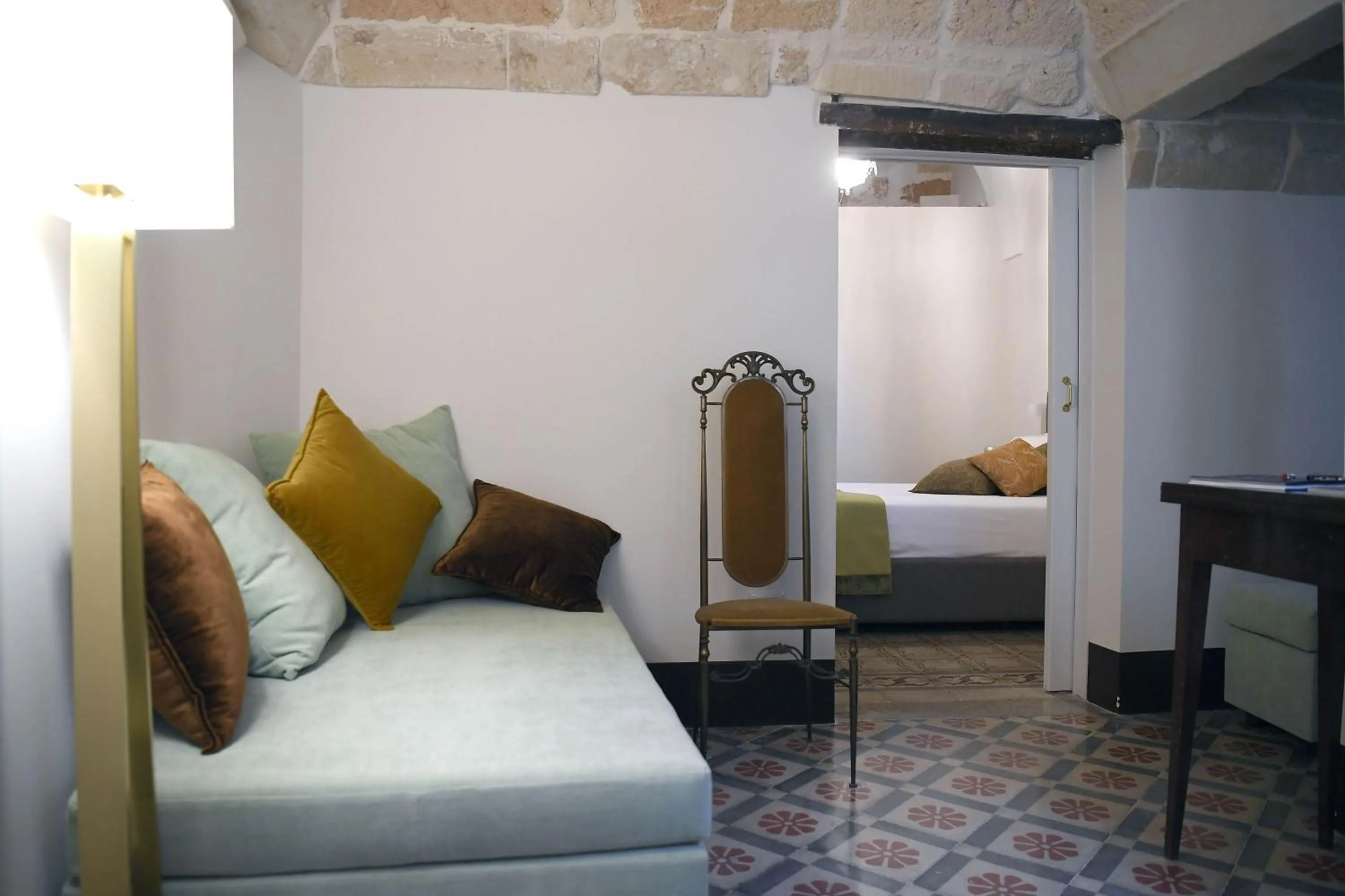 Living room, Bed in Palazzo Guido