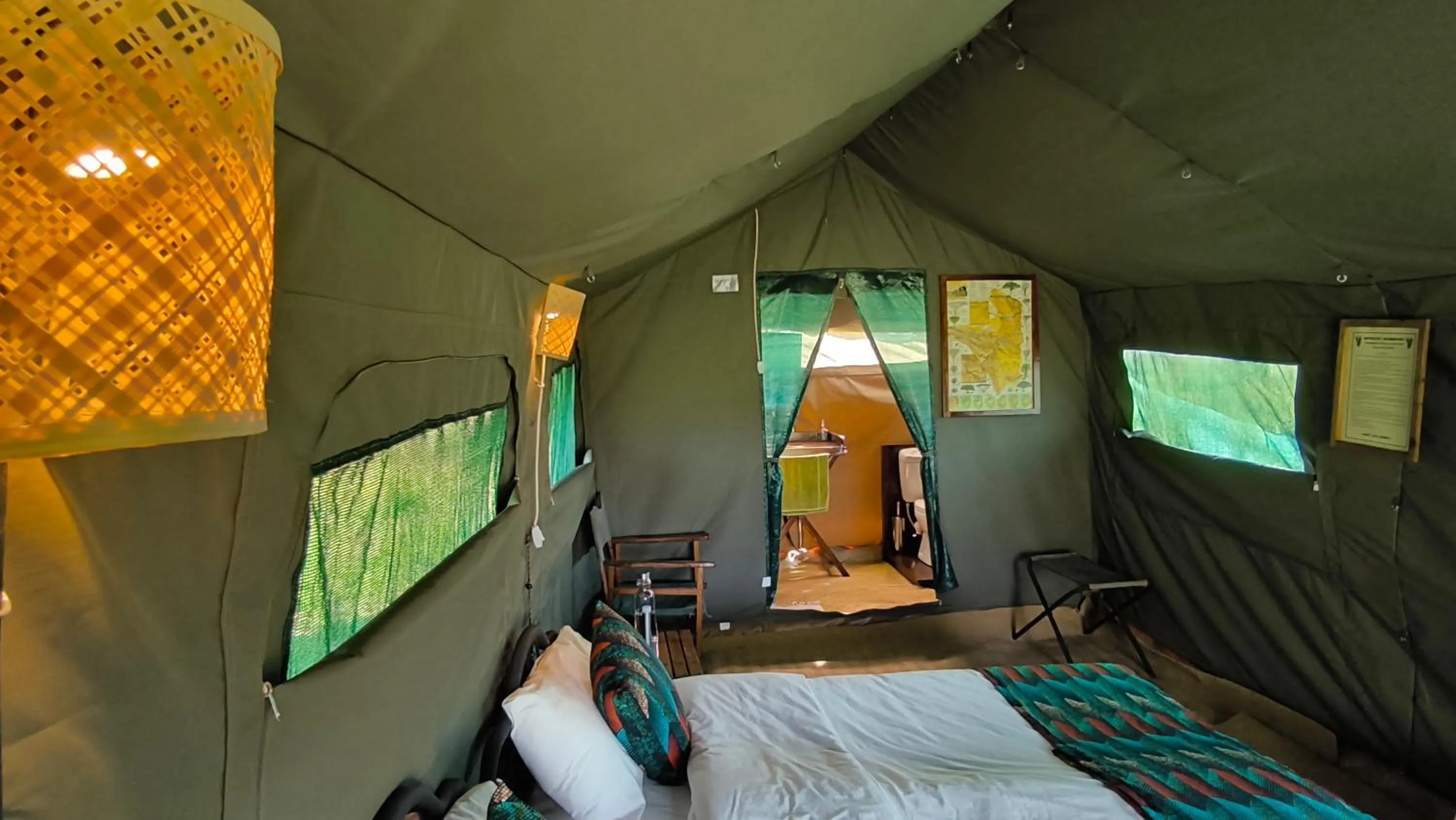 Bed in Kananga Special Tented Camp