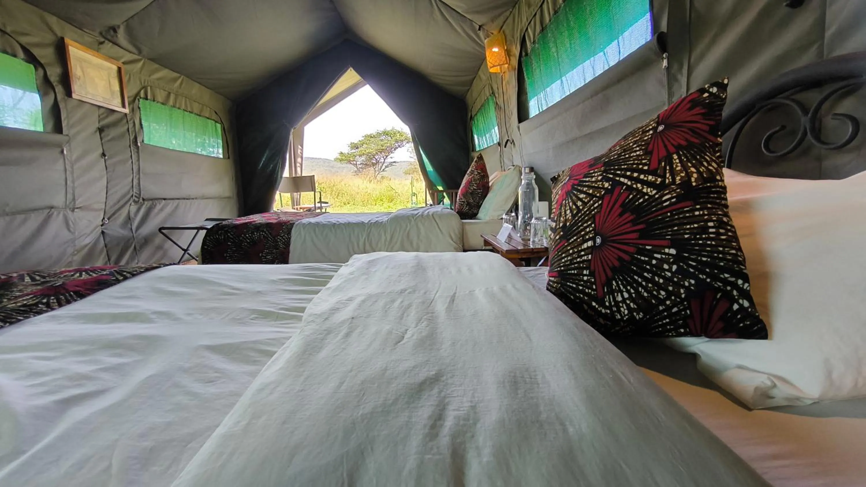 Bed in Kananga Special Tented Camp