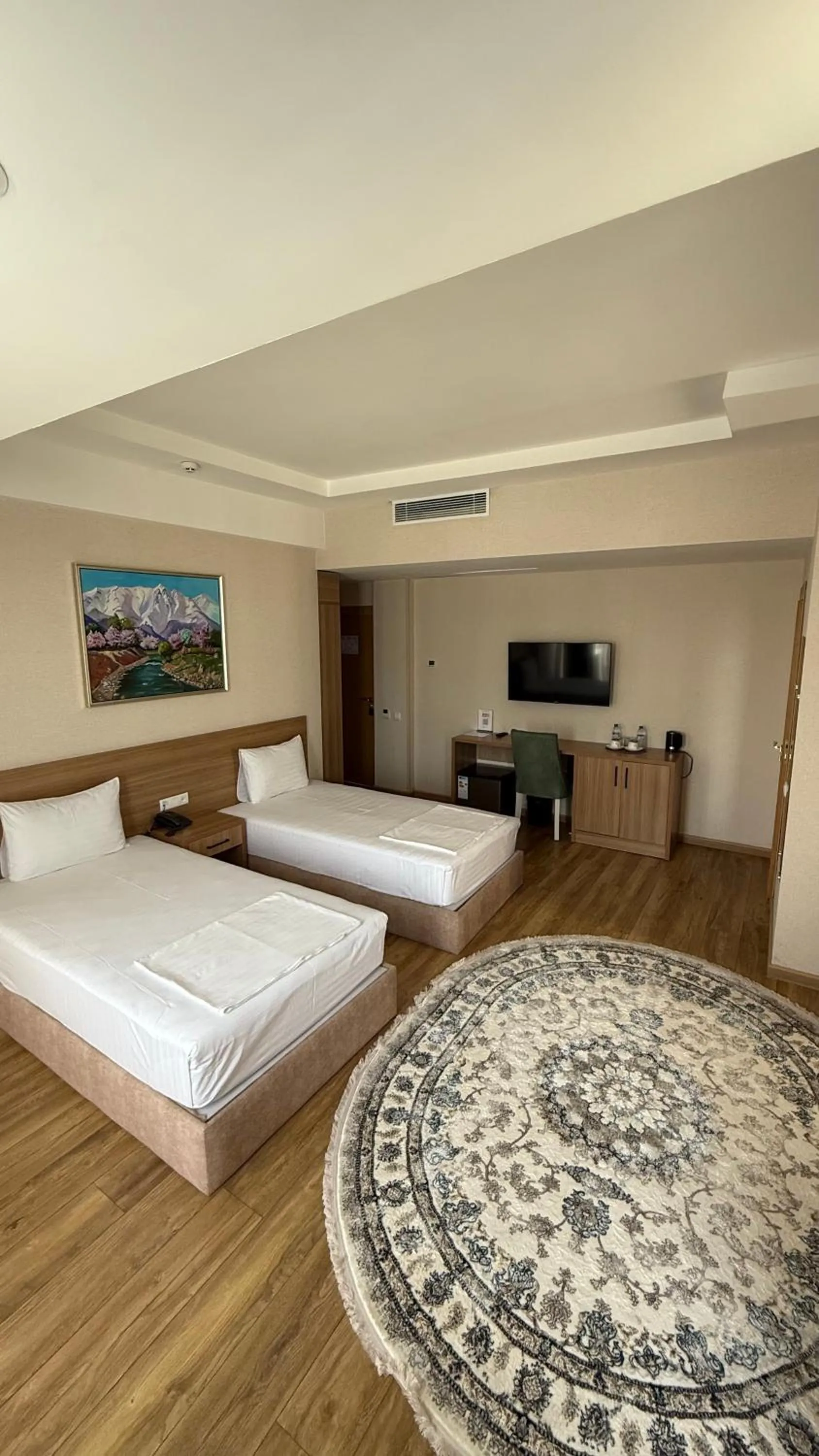 Bed in Saroy Gardens Hotel