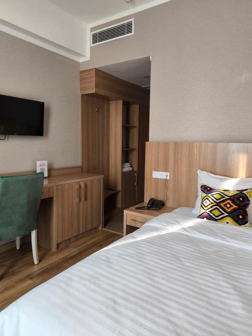 Bed in Saroy Gardens Hotel