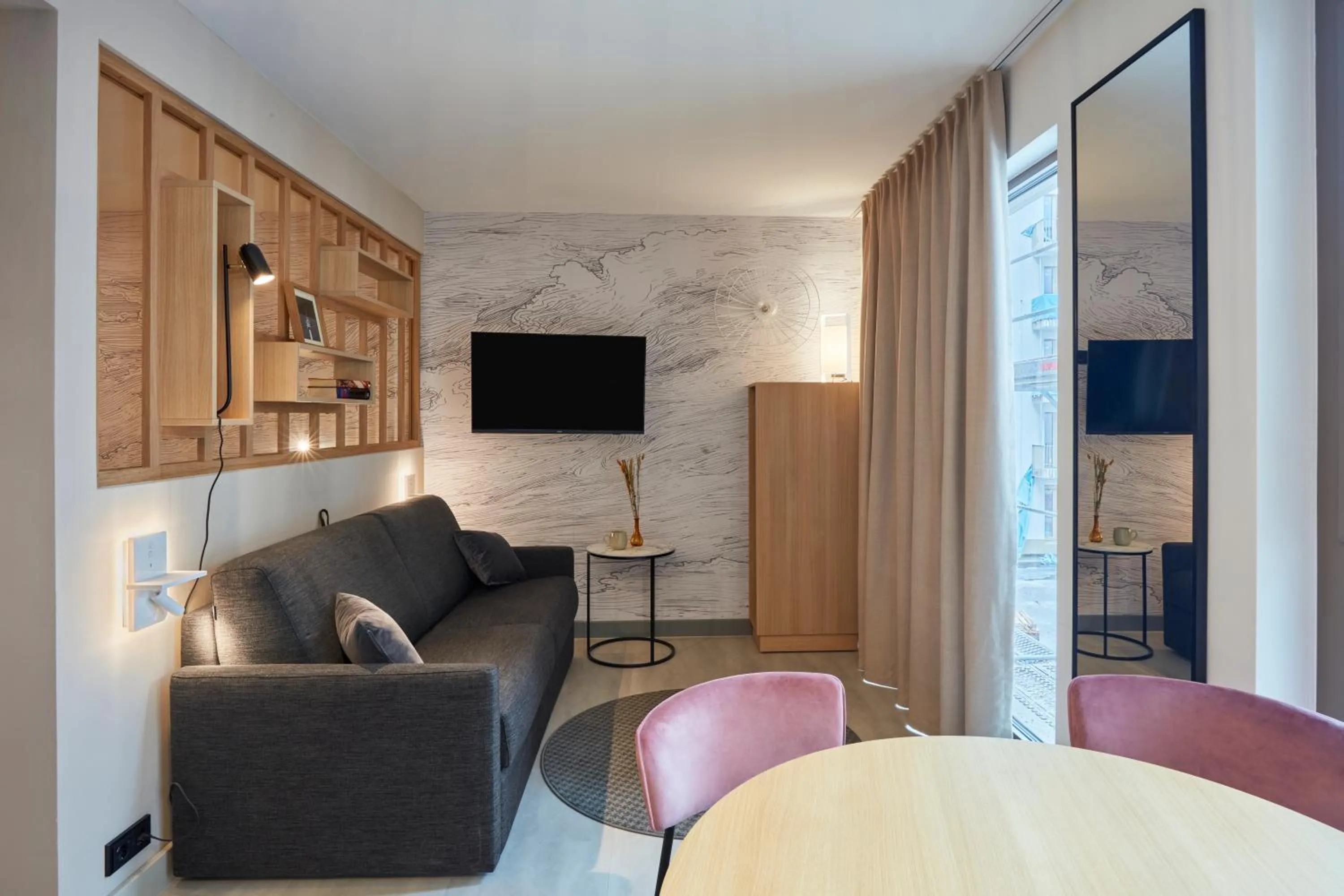 Living room in Aparthotel Adagio Stuttgart NeckarPark