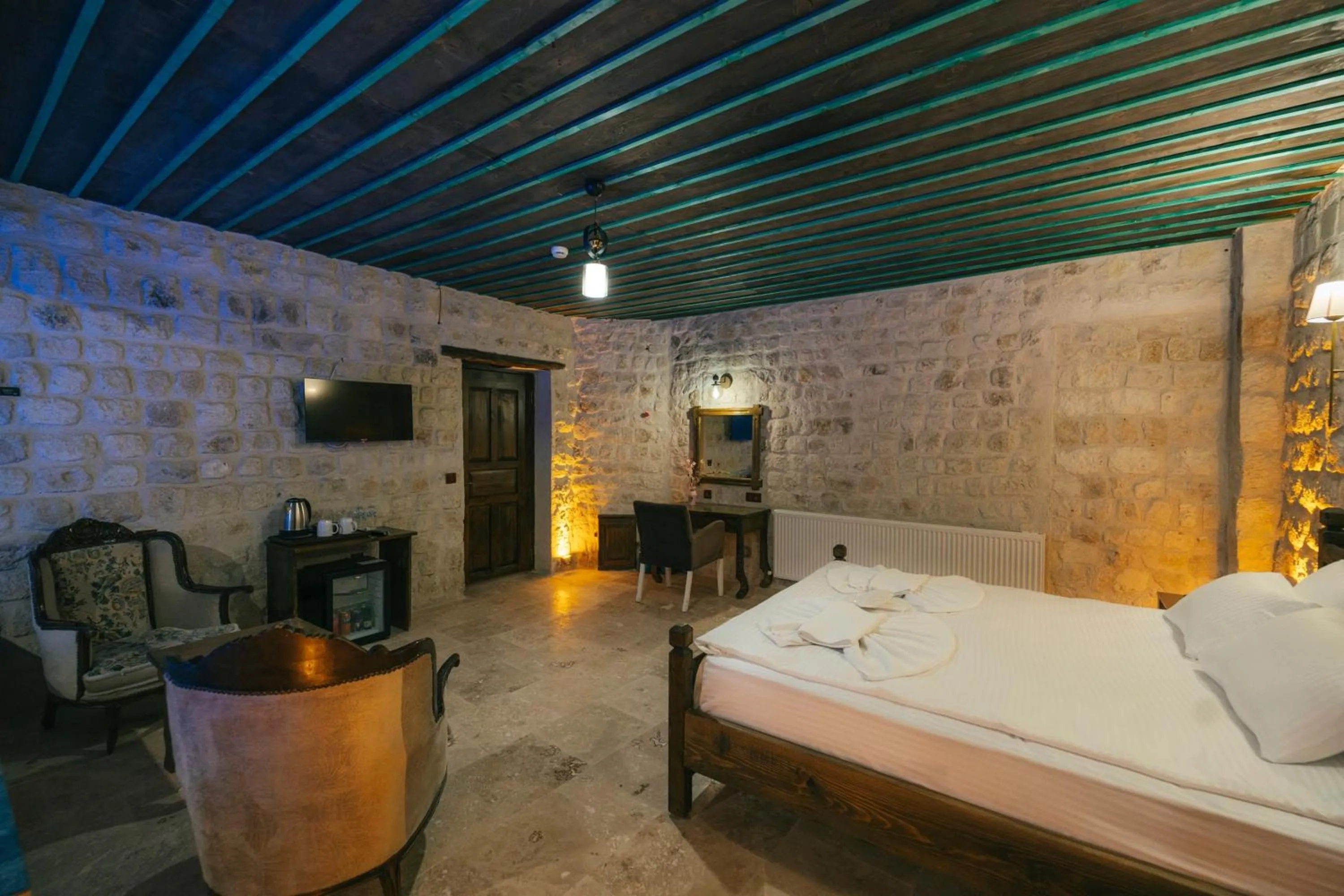 Bed in Cappatria Cave House