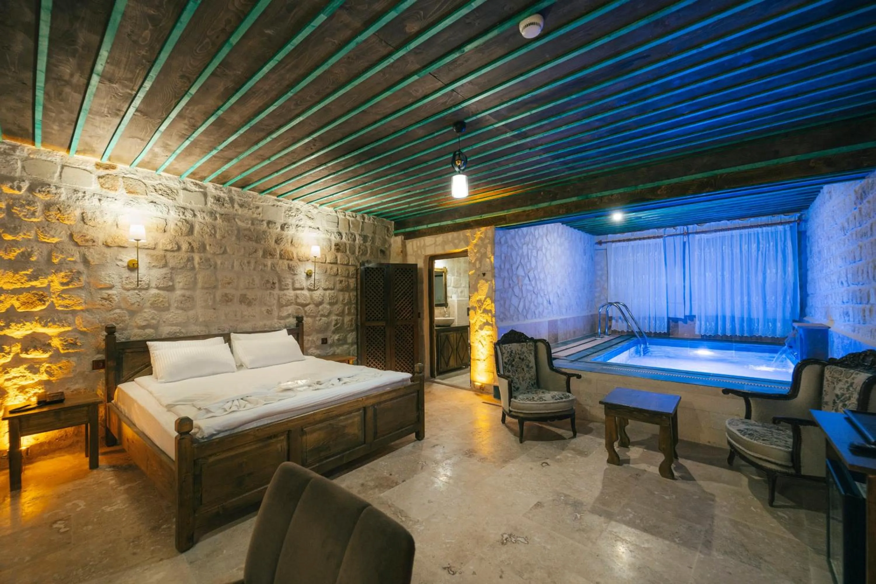 Bed in Cappatria Cave House