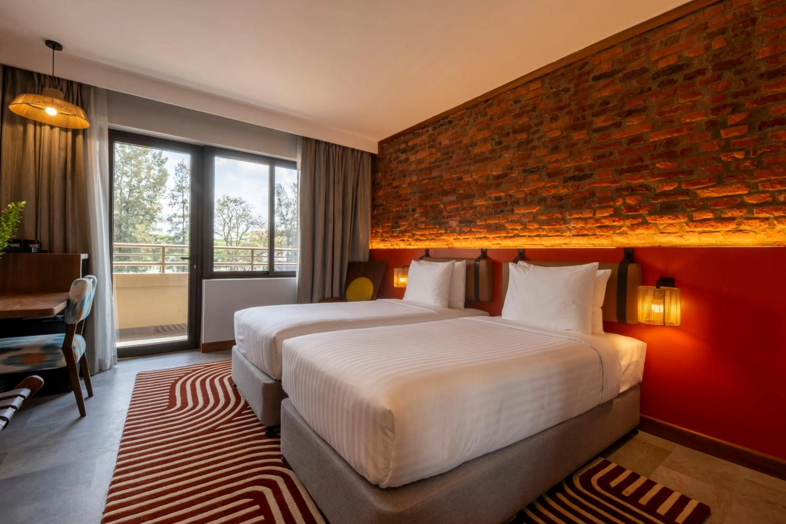 Bed in Zaria Court Kigali, Tapestry Collection by Hilton