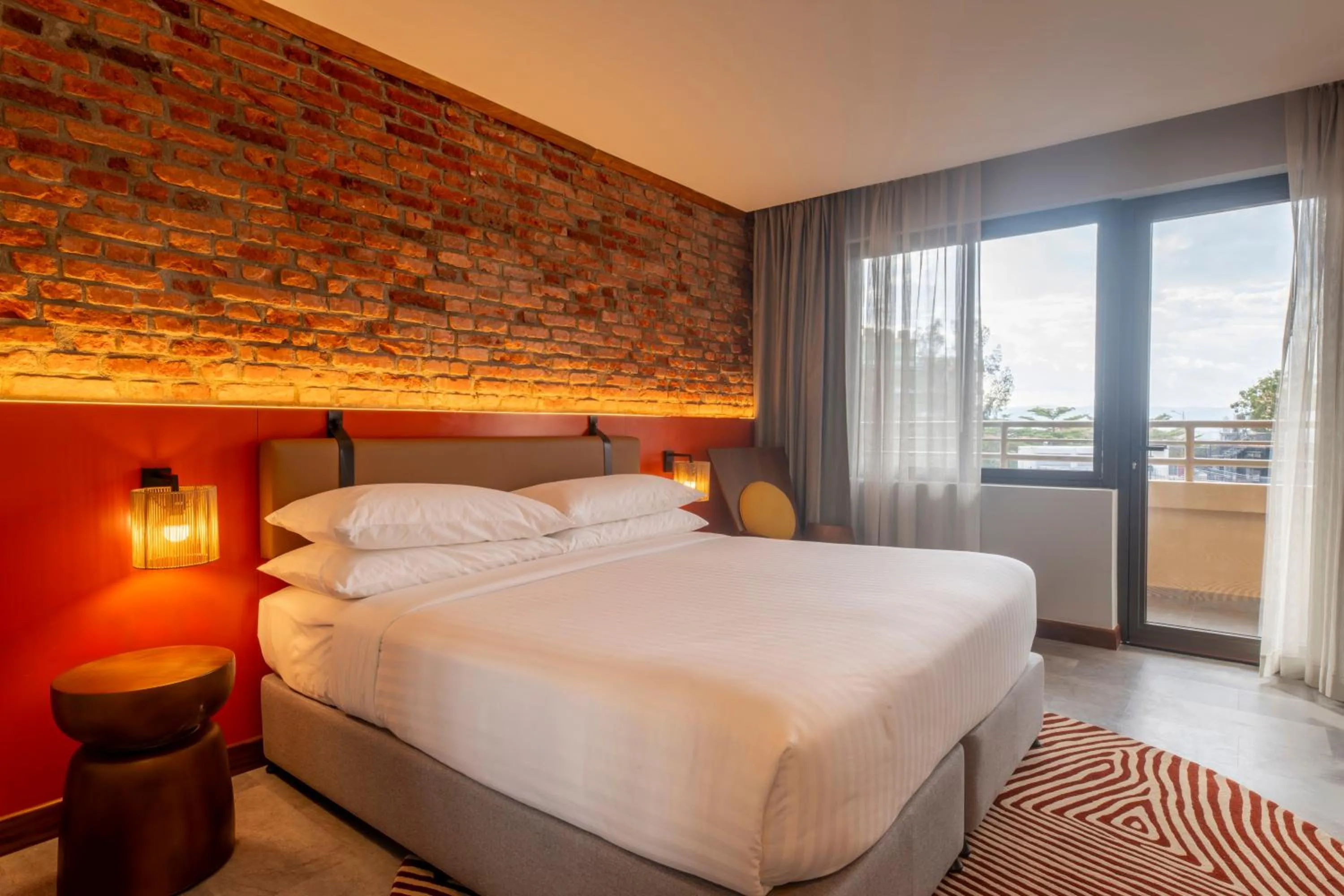 Bed in Zaria Court Kigali, Tapestry Collection by Hilton