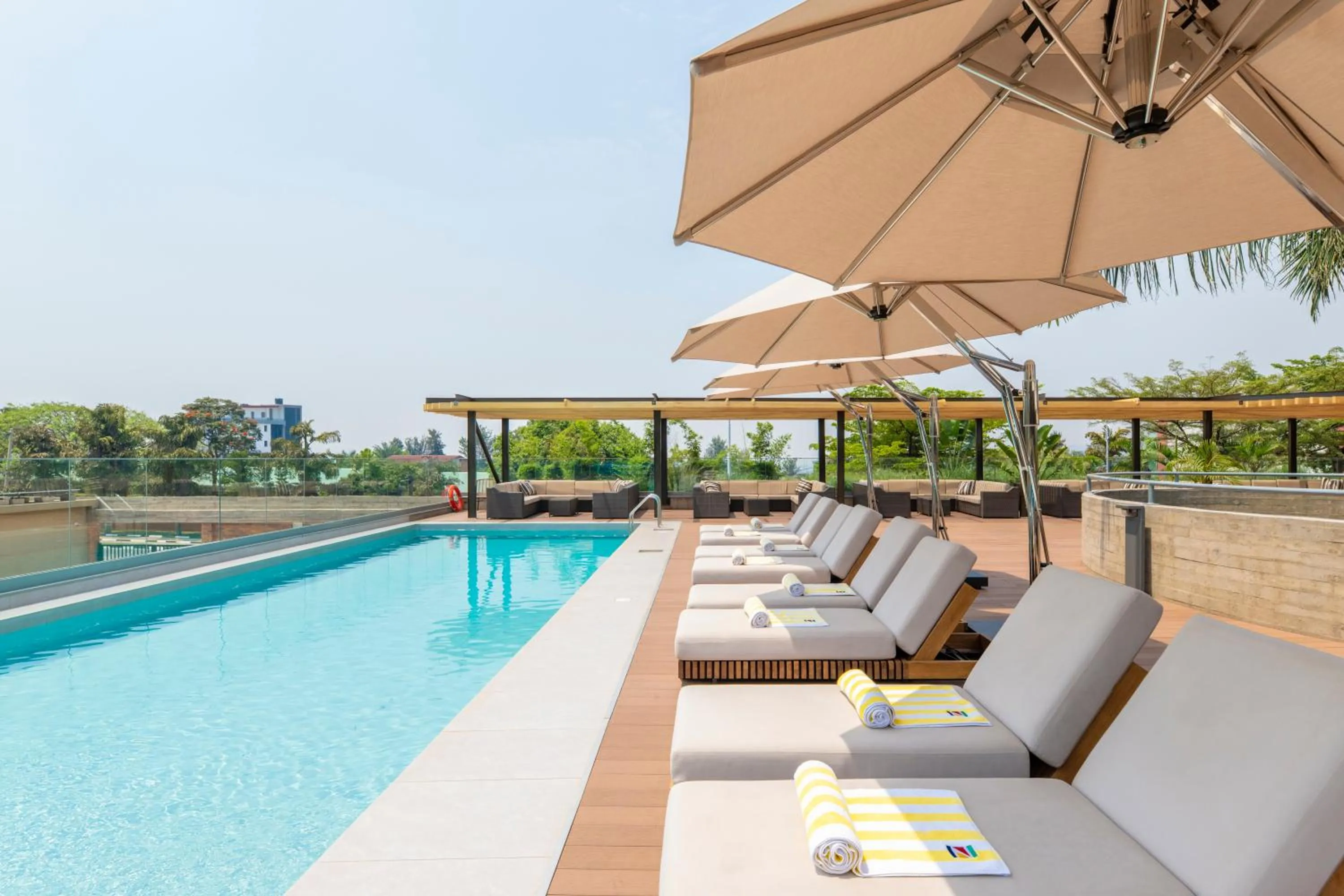 Swimming pool in Zaria Court Kigali, Tapestry Collection by Hilton