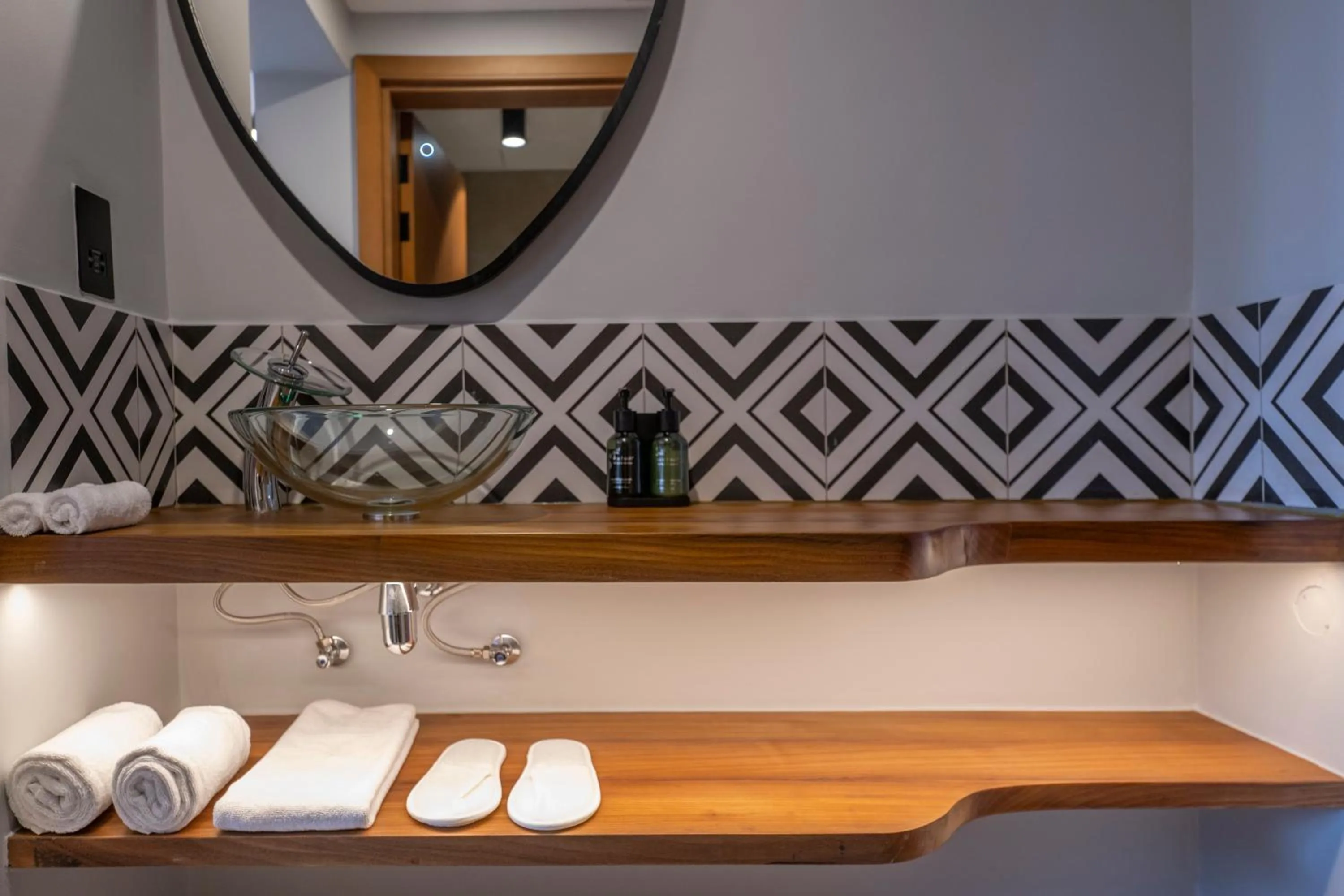 Bathroom in Zaria Court Kigali, Tapestry Collection by Hilton