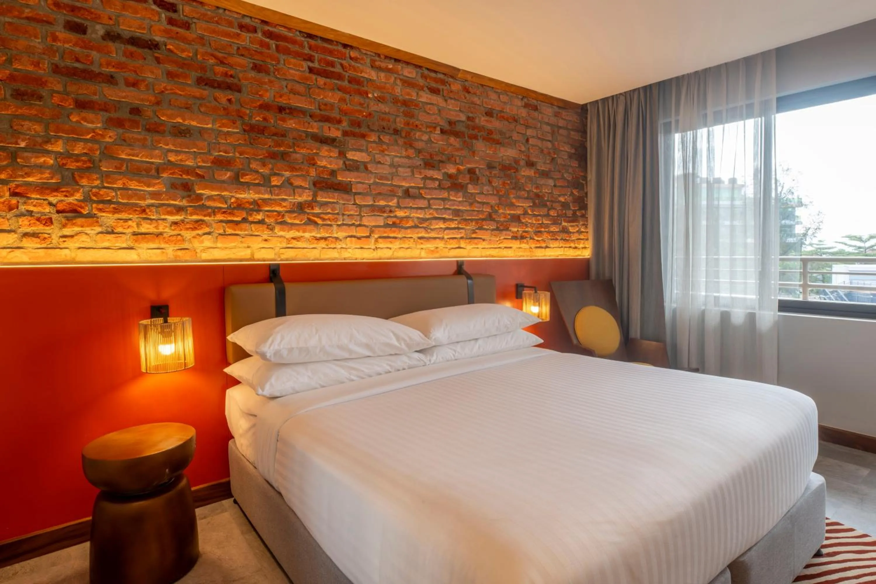 Bed in Zaria Court Kigali, Tapestry Collection by Hilton