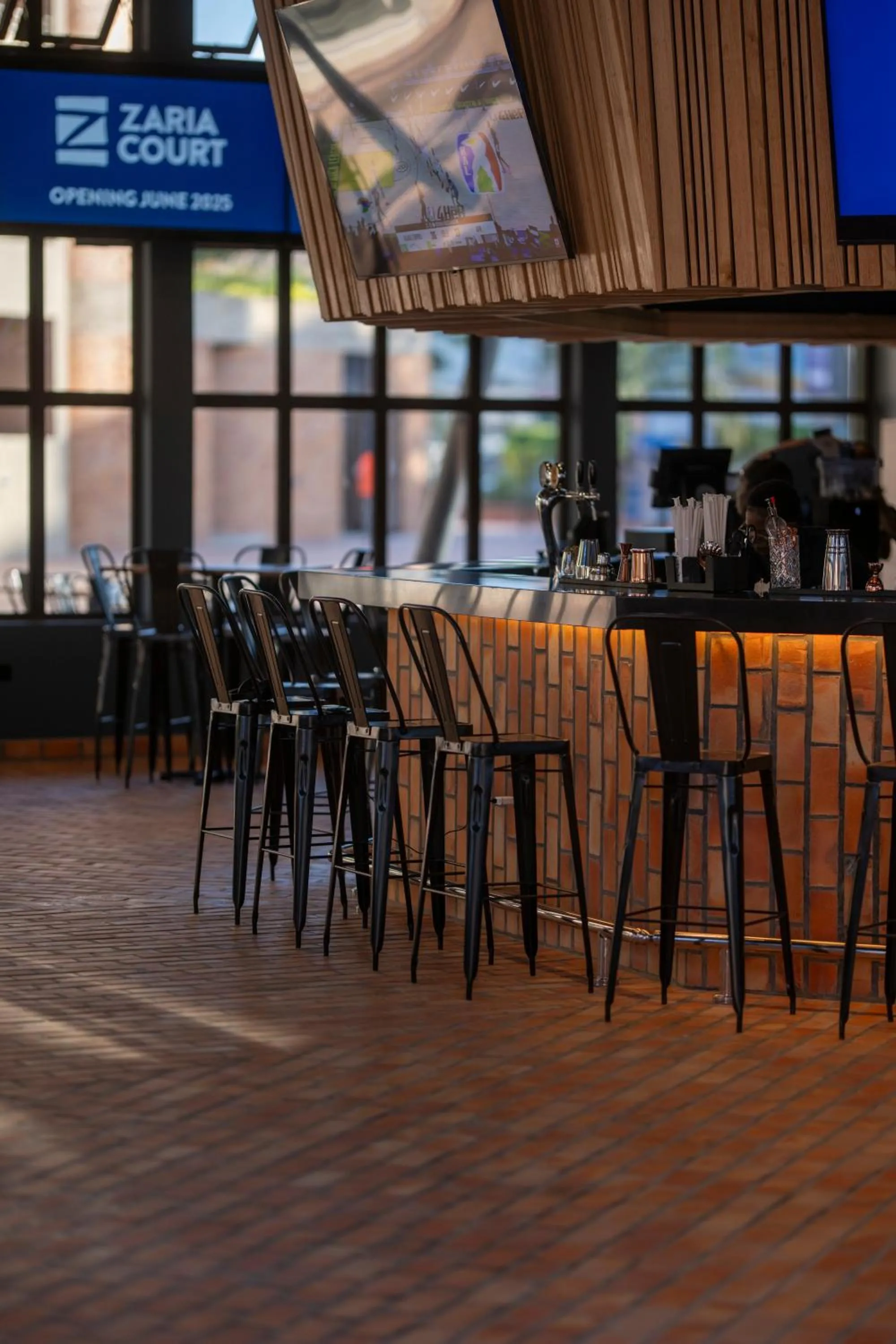 Lounge or bar in Zaria Court Kigali, Tapestry Collection by Hilton