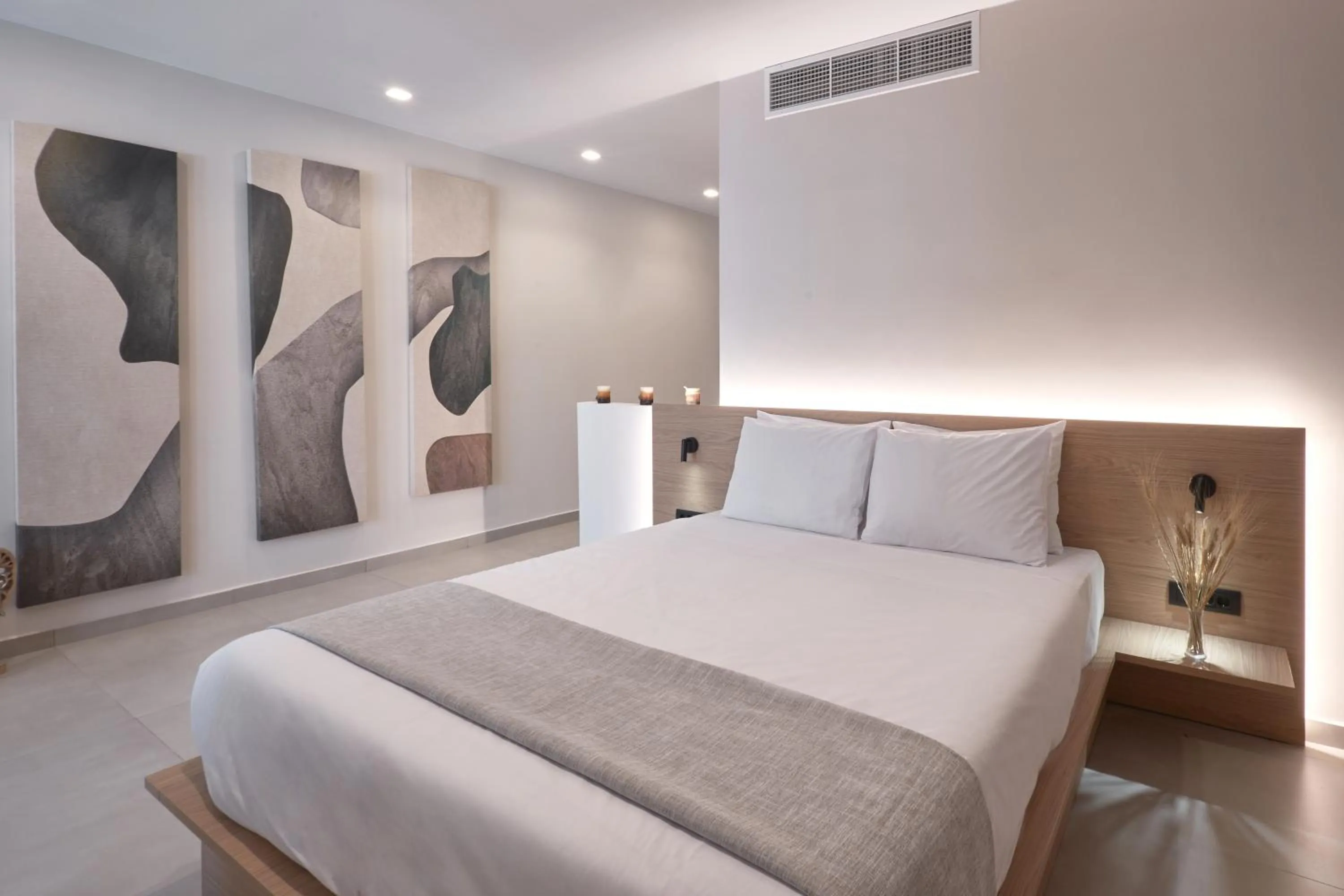 Bed in Athens City Suites