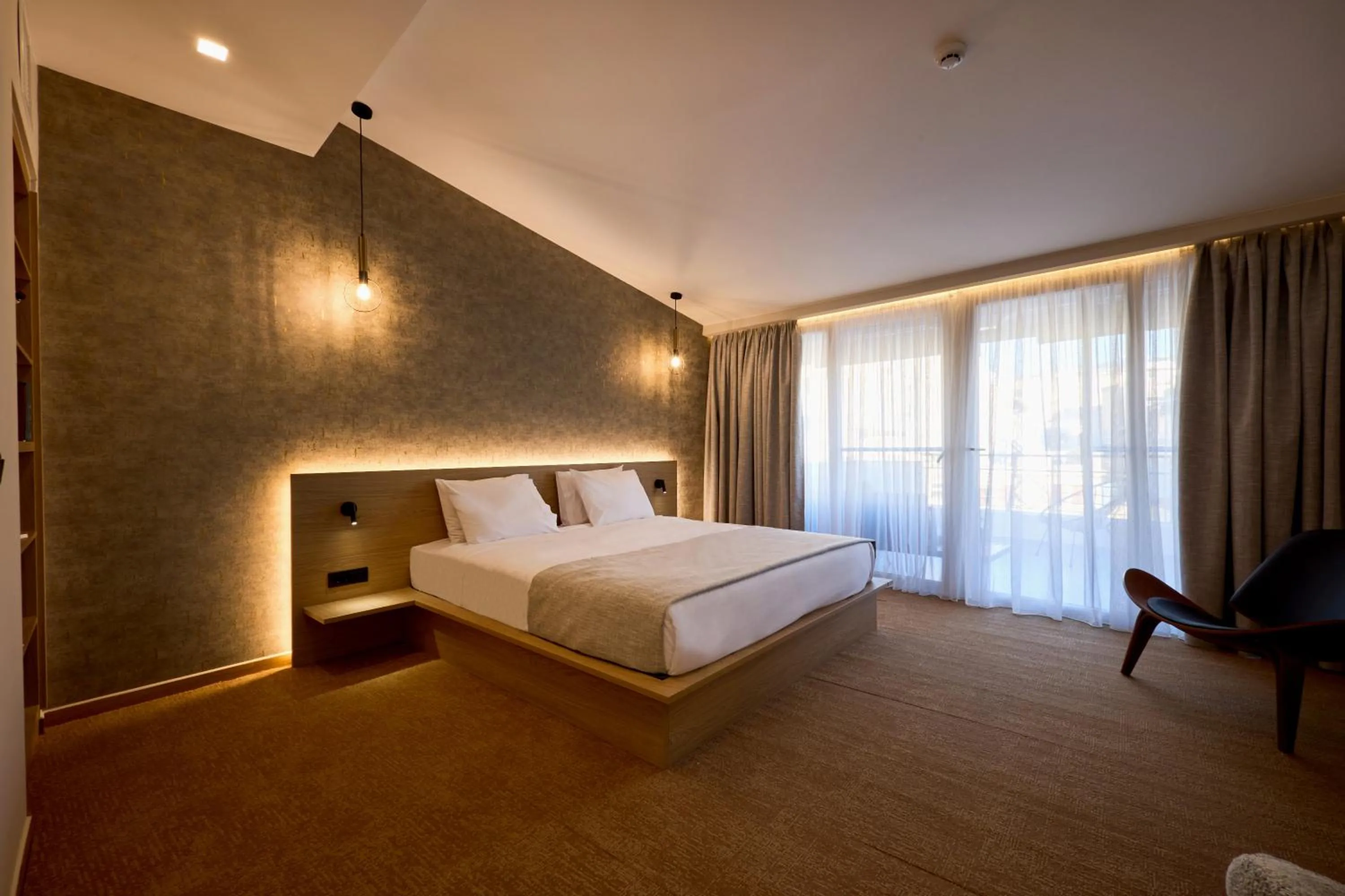 Bed in Athens City Suites