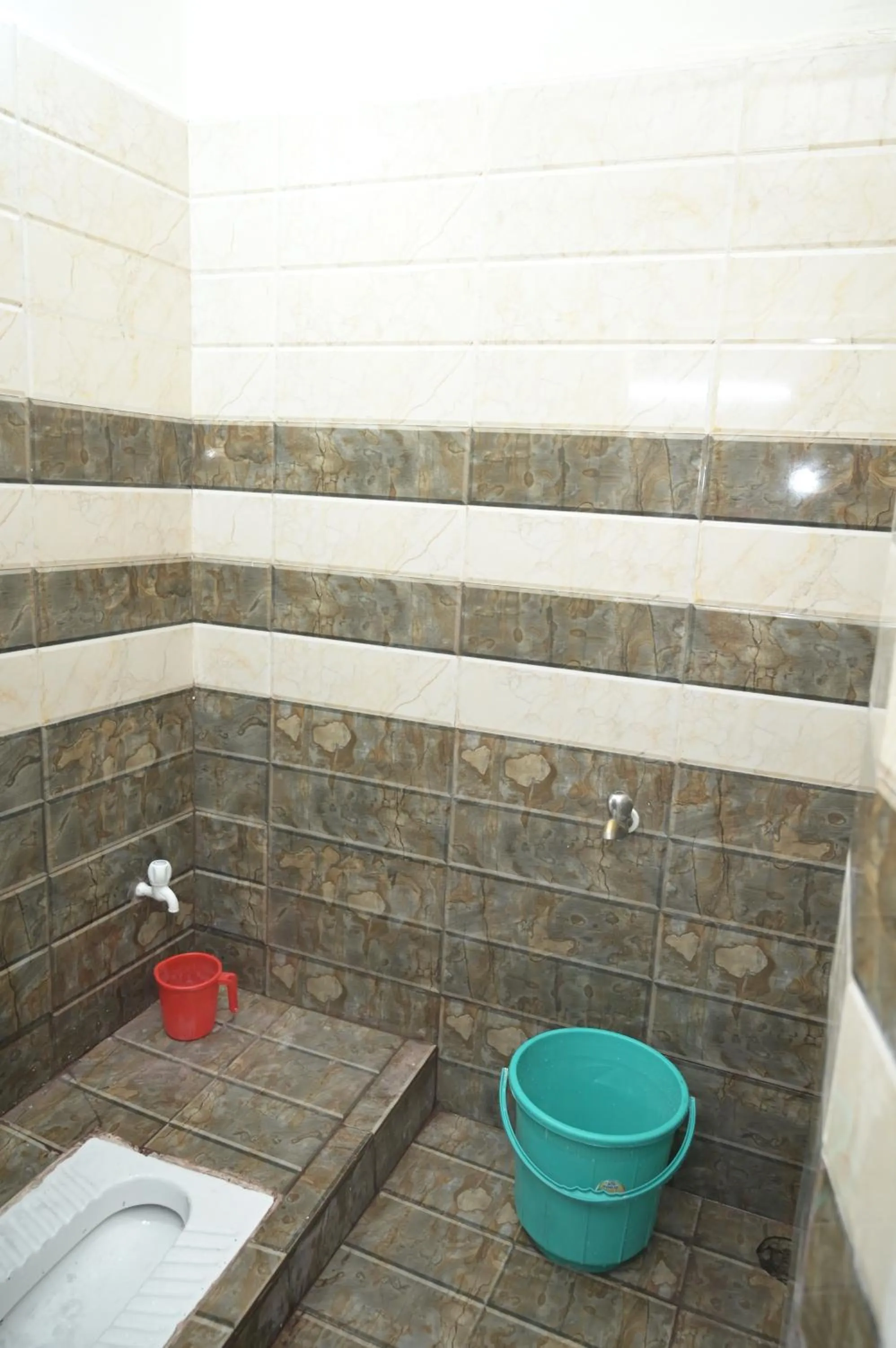 Toilet in Rk hotel Rooms