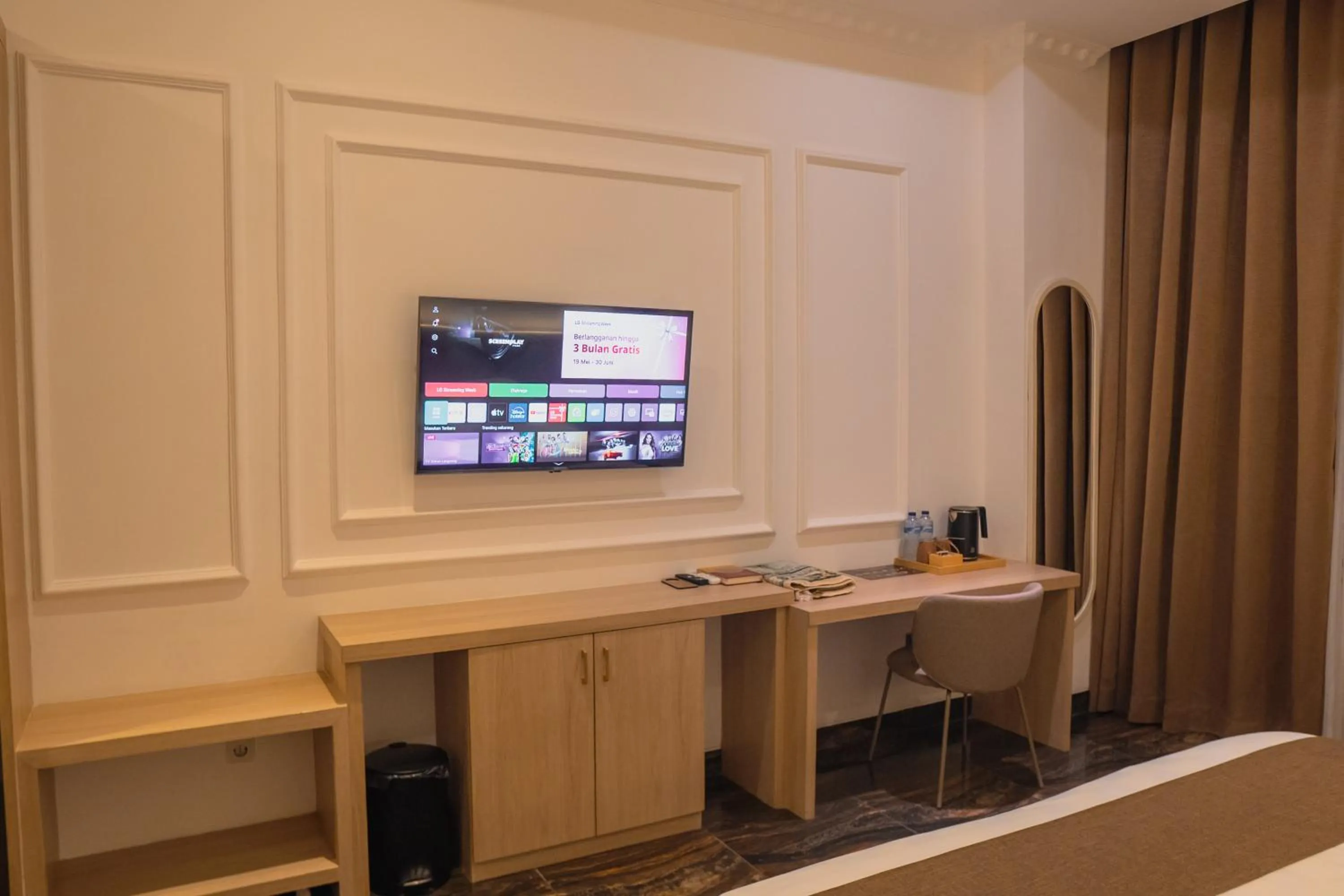 TV and multimedia in Fahira Hotel Syariah Padang