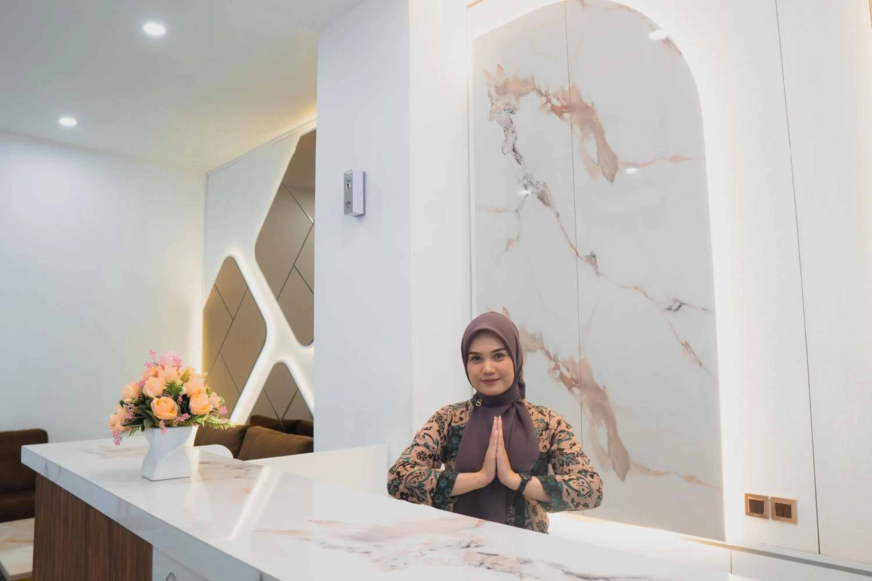 Lobby or reception in Fahira Hotel Syariah Padang