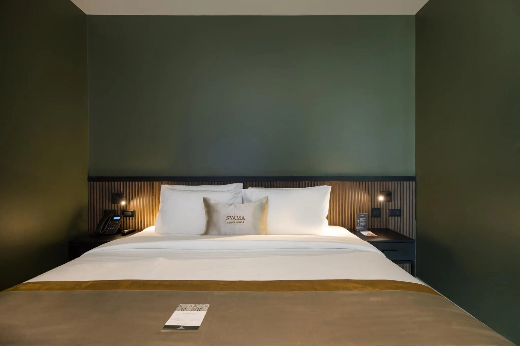 Bed in Syama Mansion Patong, an Aspira Collection