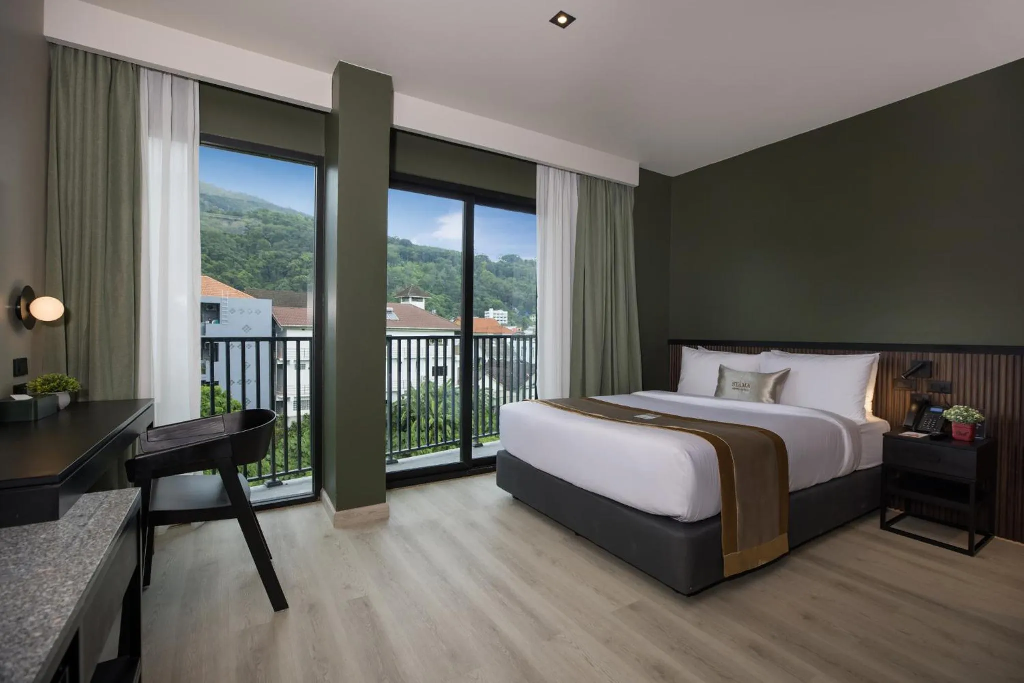 Bed in Syama Mansion Patong, an Aspira Collection