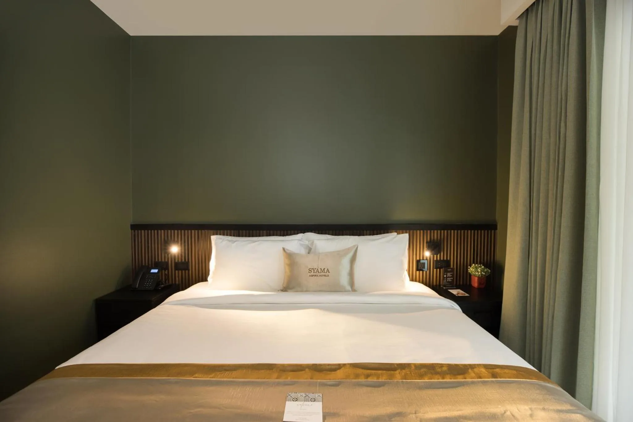 Bed in Syama Mansion Patong, an Aspira Collection