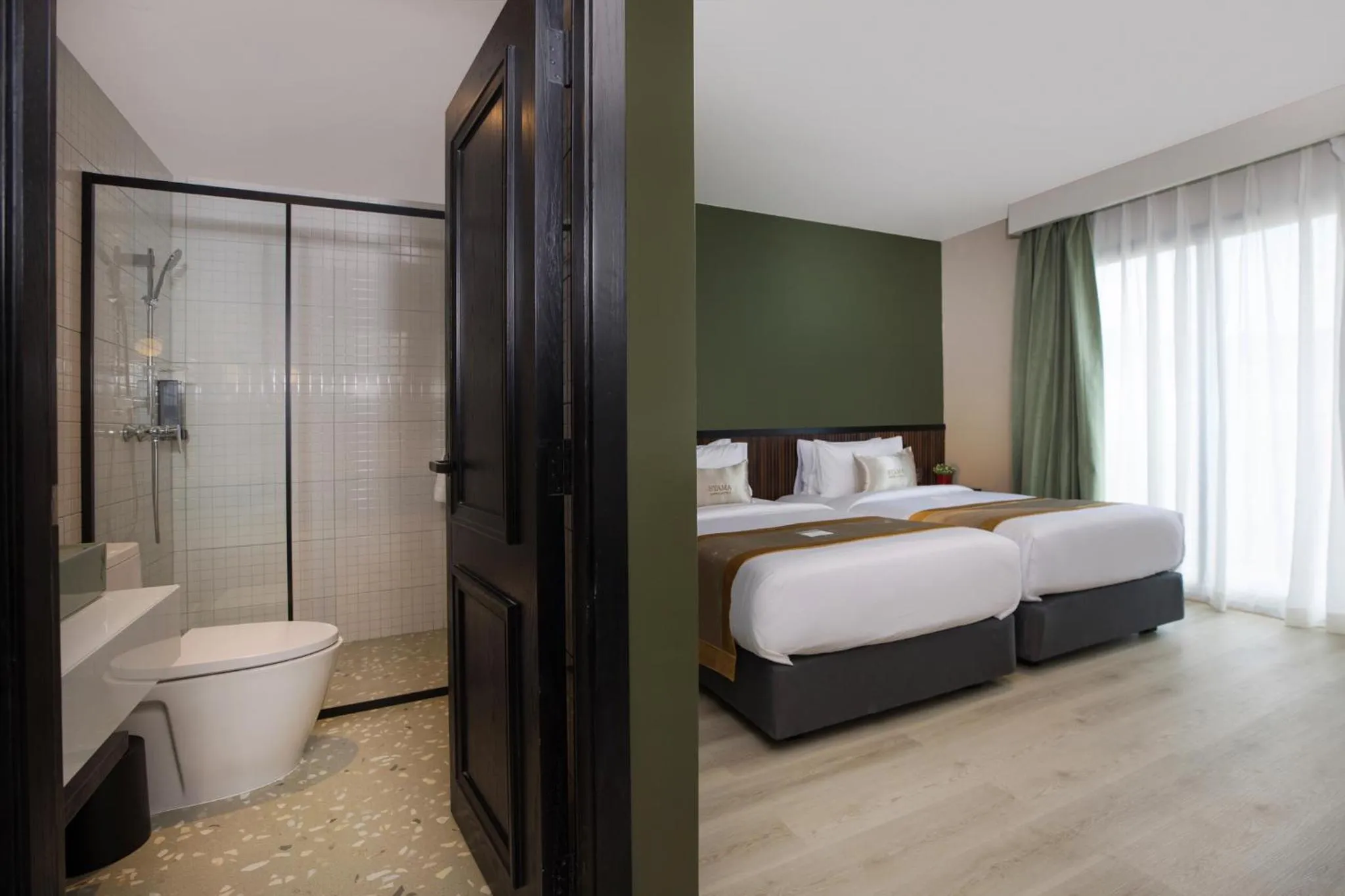 Toilet, Bed in Syama Mansion Patong, an Aspira Collection