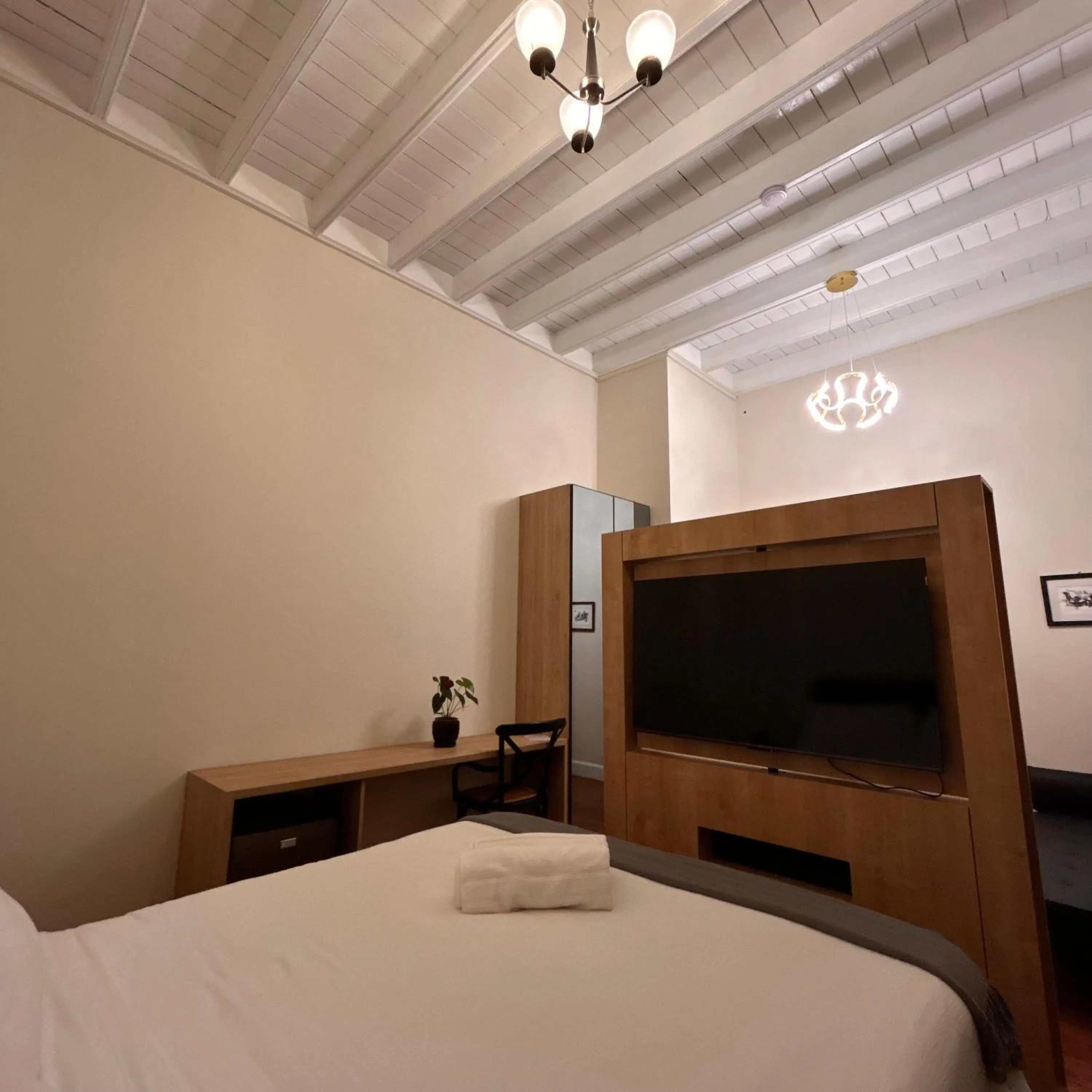 Bed in Andara Boutique Hotel