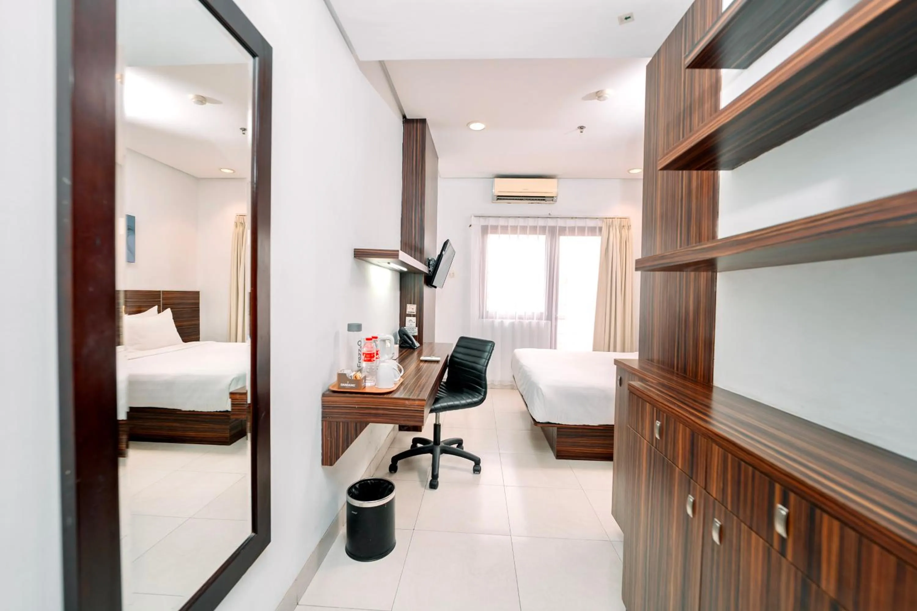 Bed in Shankee Suites Sudirman