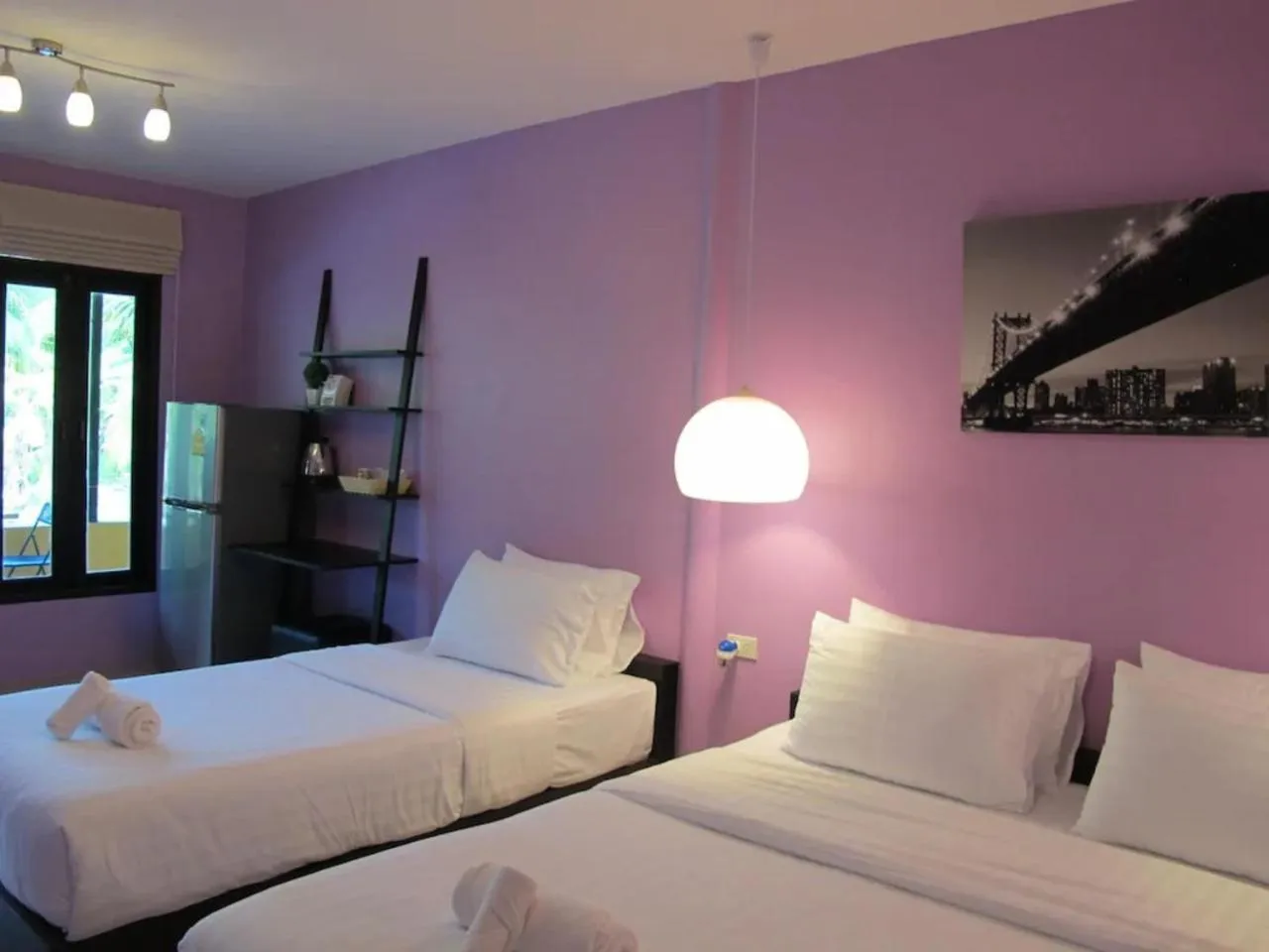 Bed in Panviman Amphawa Garden Resort