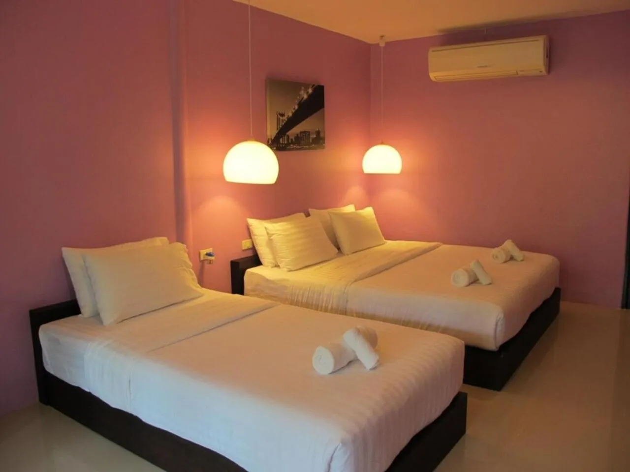 Bed in Panviman Amphawa Garden Resort